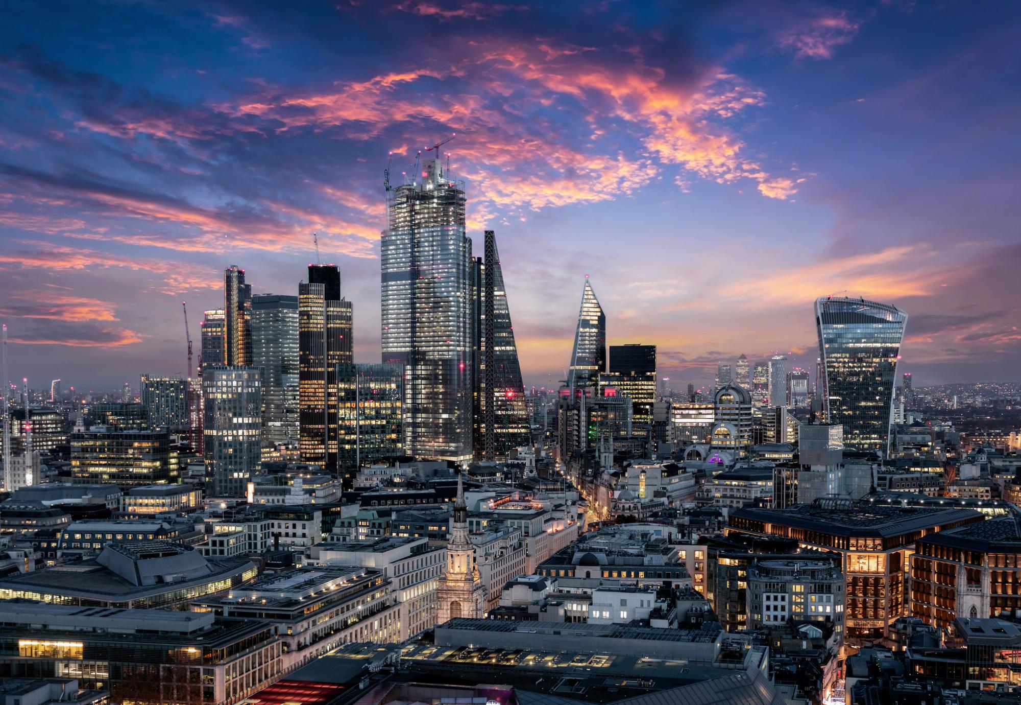 Picture of London's financial district at night.