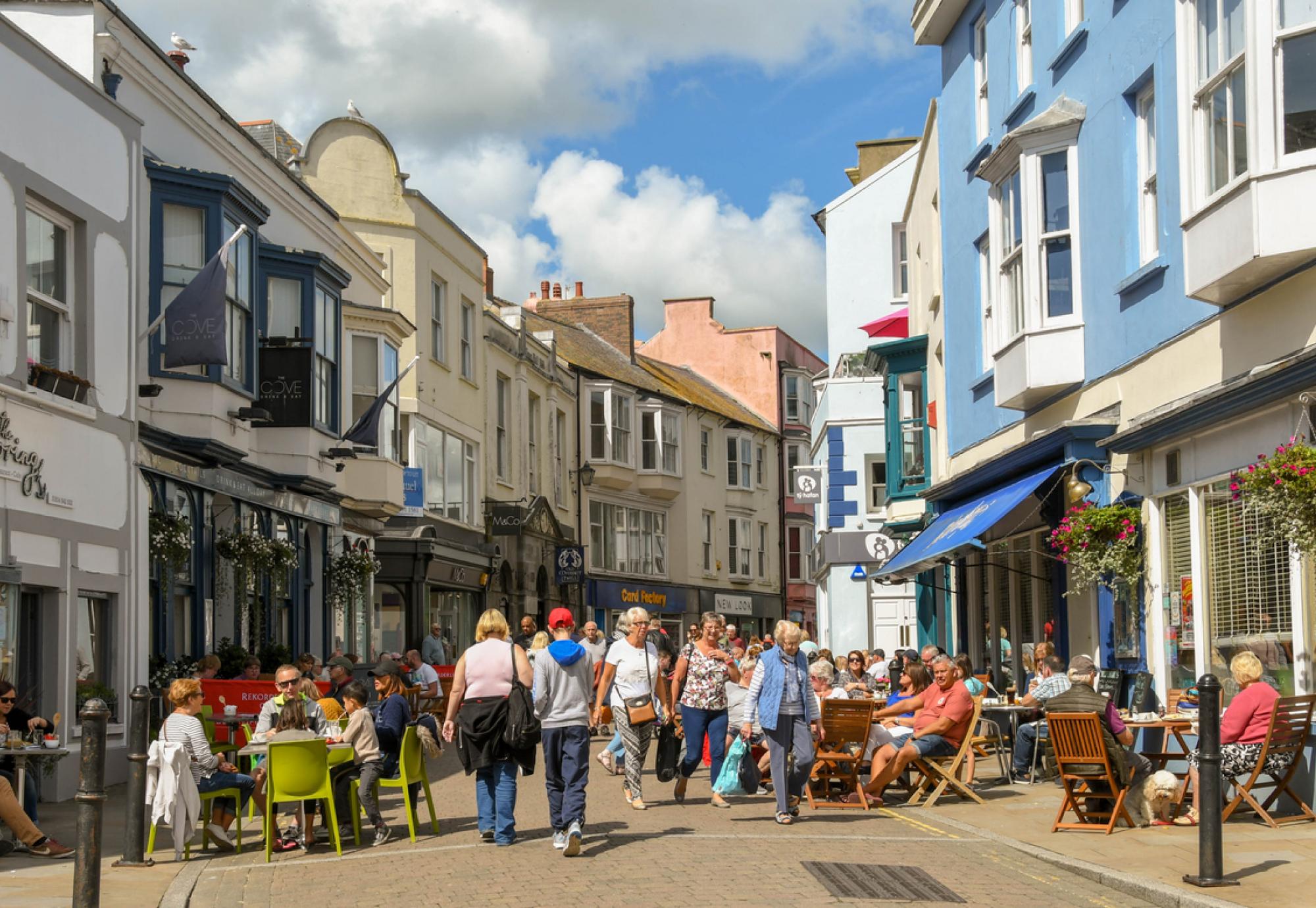 People on busy street in Tenby
