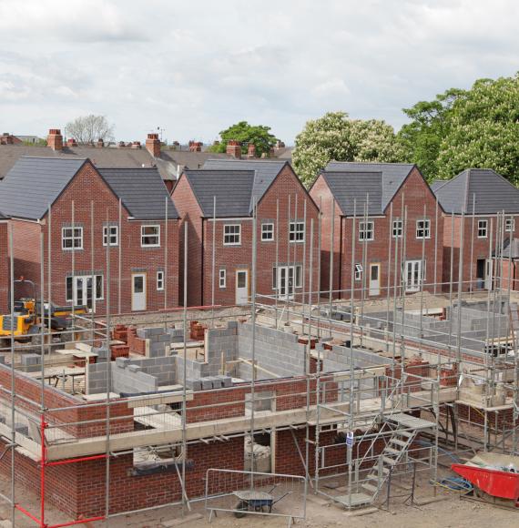 Houses being built on a construction site
