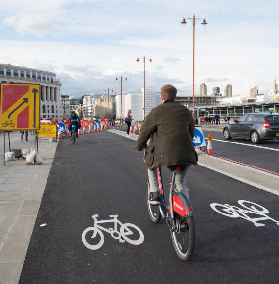 Cyclists using the new TfL Cycle Superhighway on Blackfriars Bridge in central London