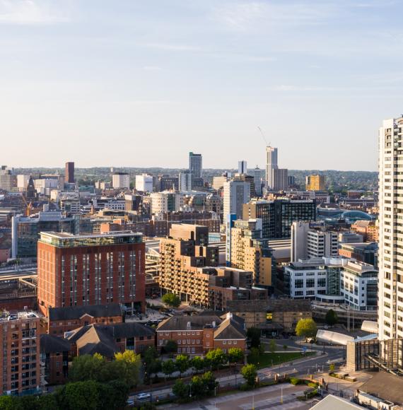 Aerial view of Leeds city centre skyline in West Yorkshire at sunset