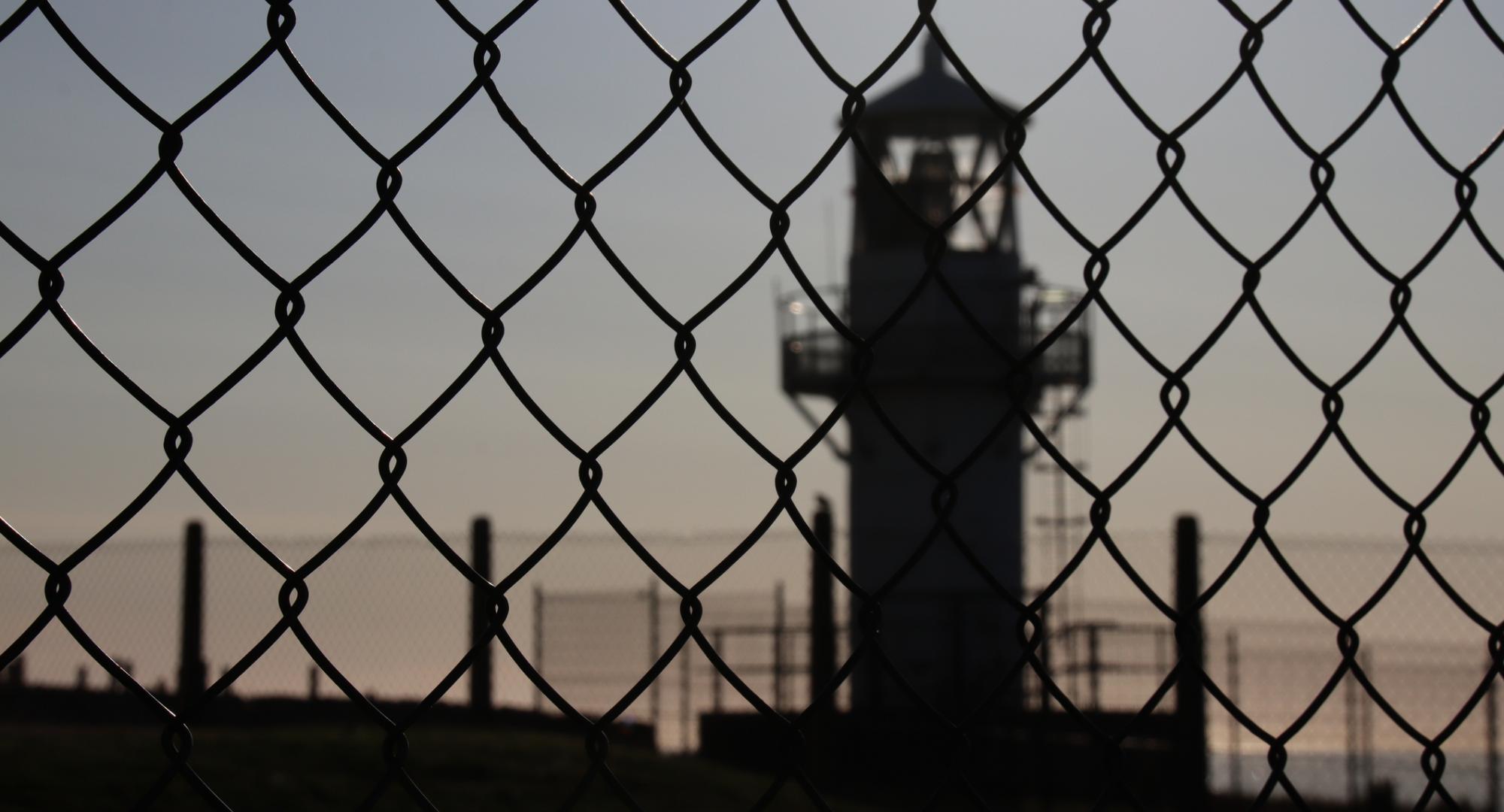 Prison fence and tower