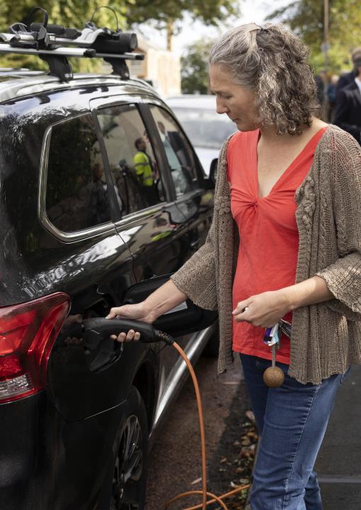 Lady using car charger