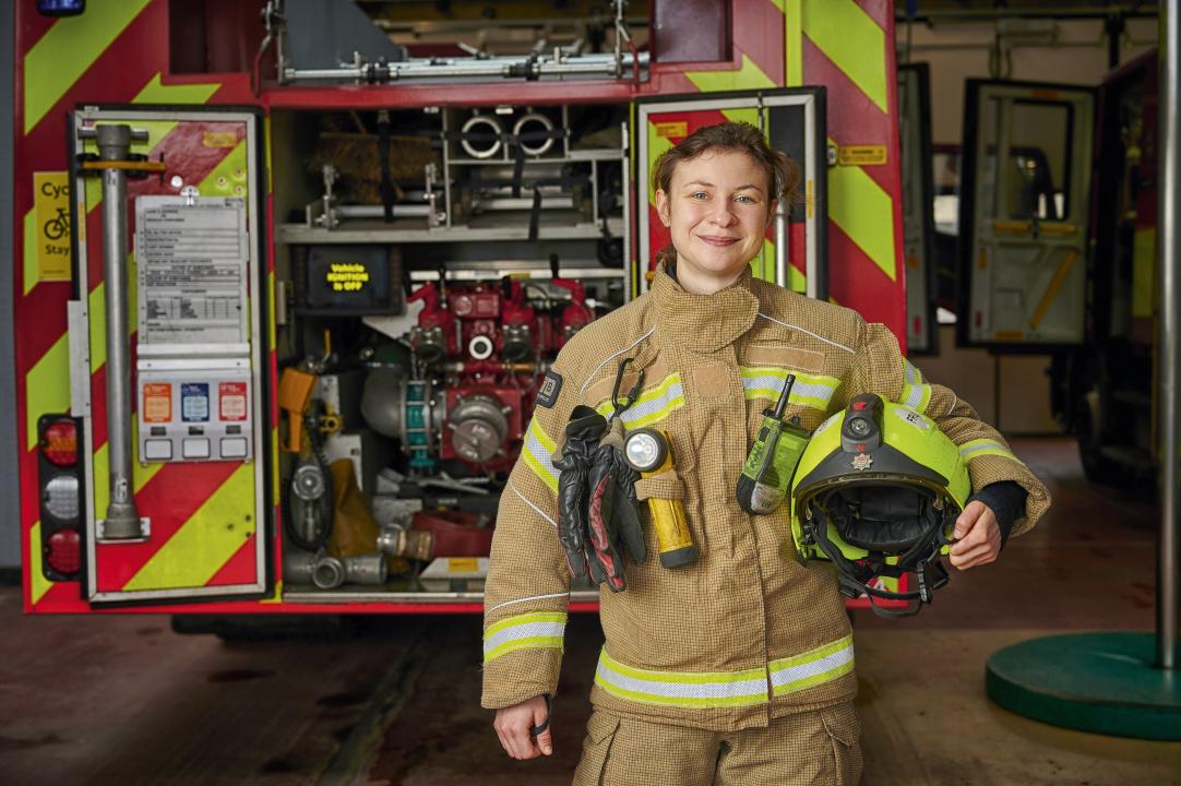 Firefighter outside station