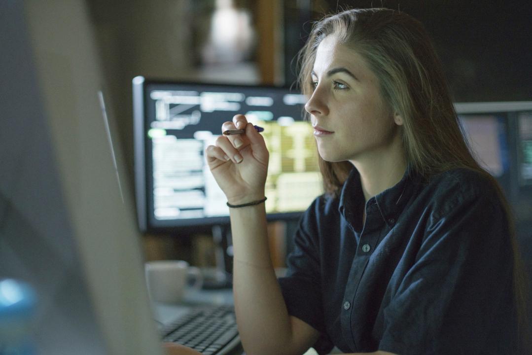 Young woman analysing data