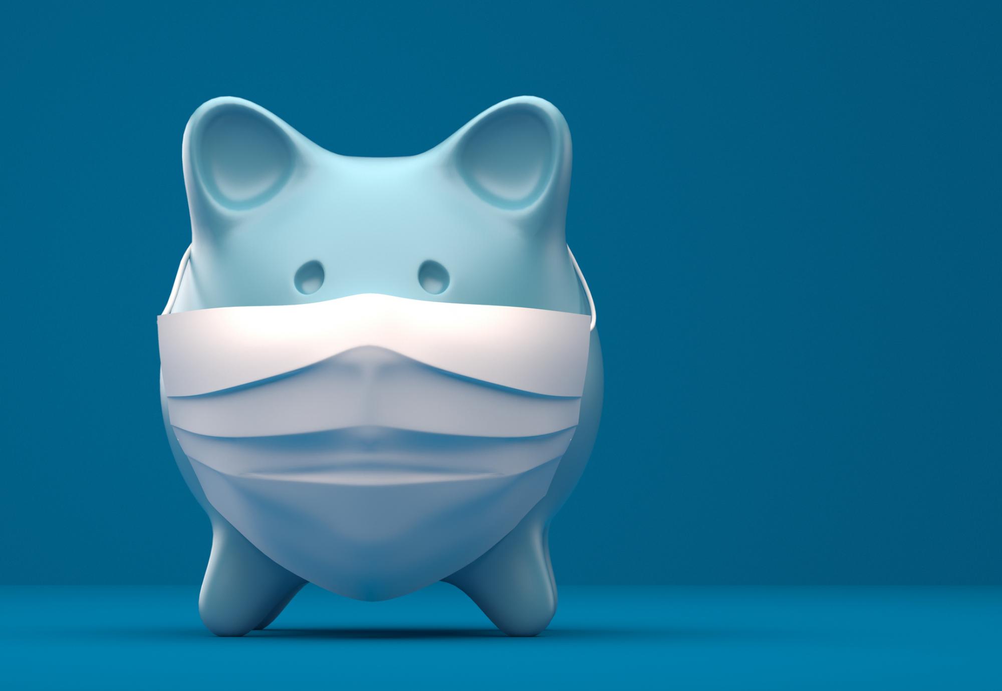 Piggy bank wearing a surgical mask.