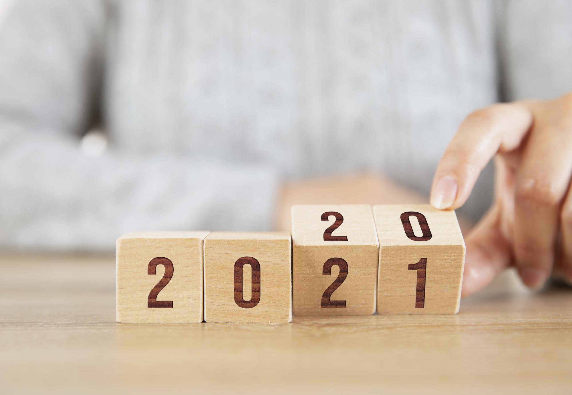 Woman turns over from 2020 to 2021. 