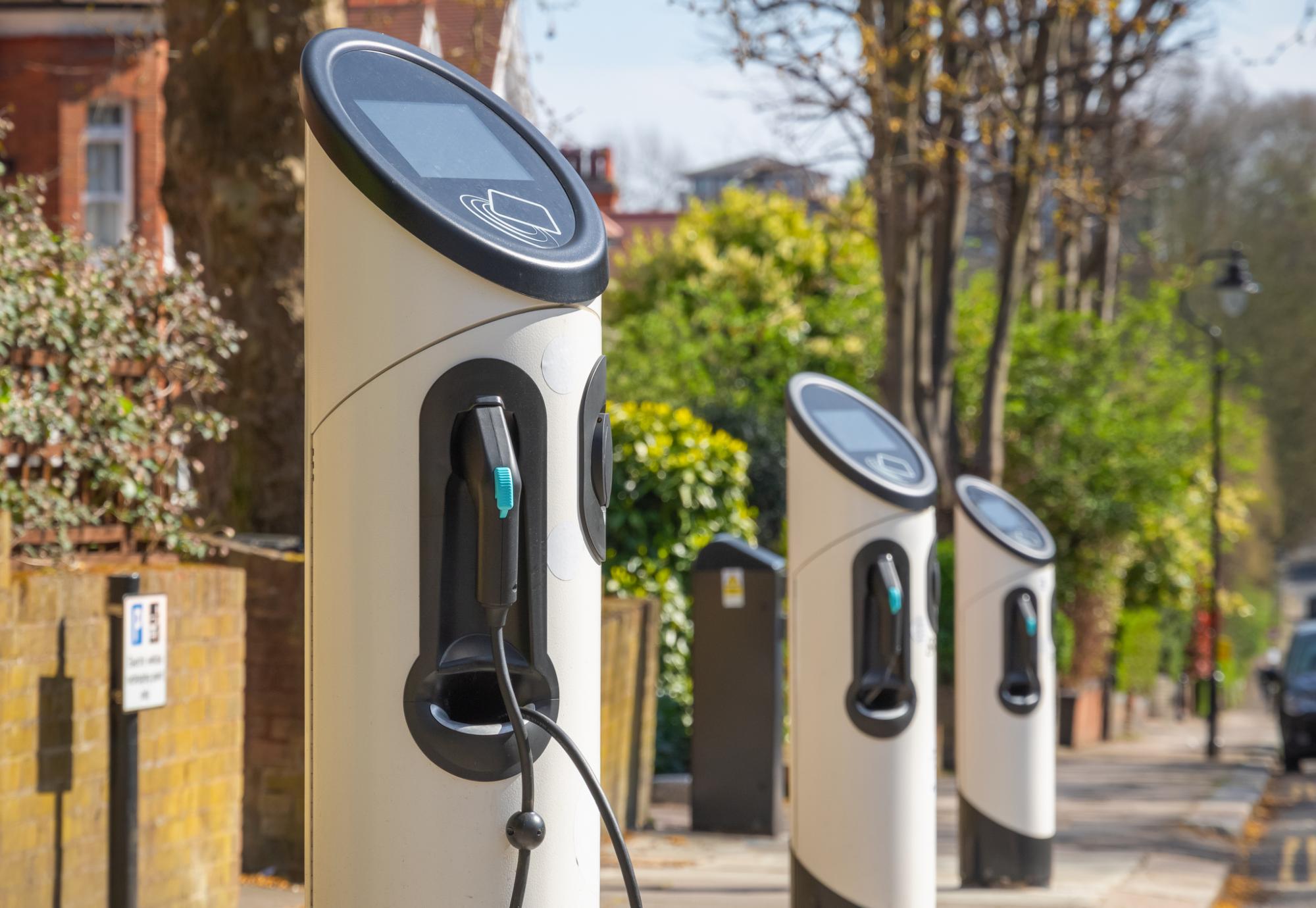 Electric vehicle charging points in the street. 