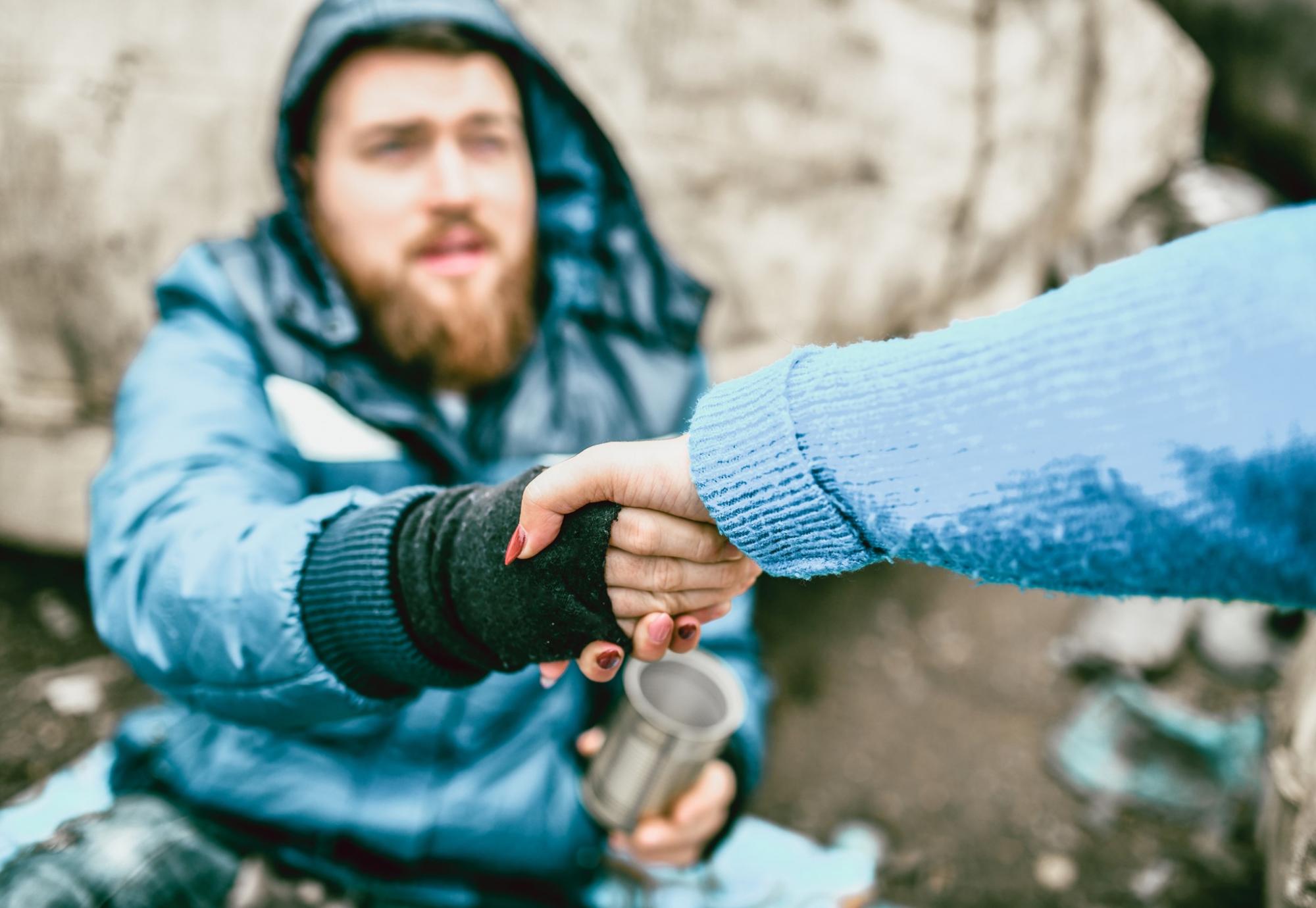 Homeless man helped off the street