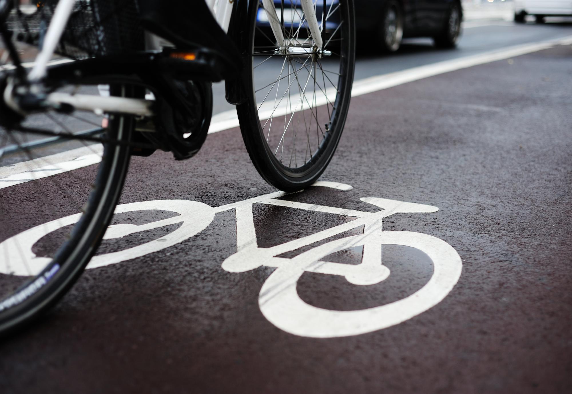 Bike wheels visible on a bike lane