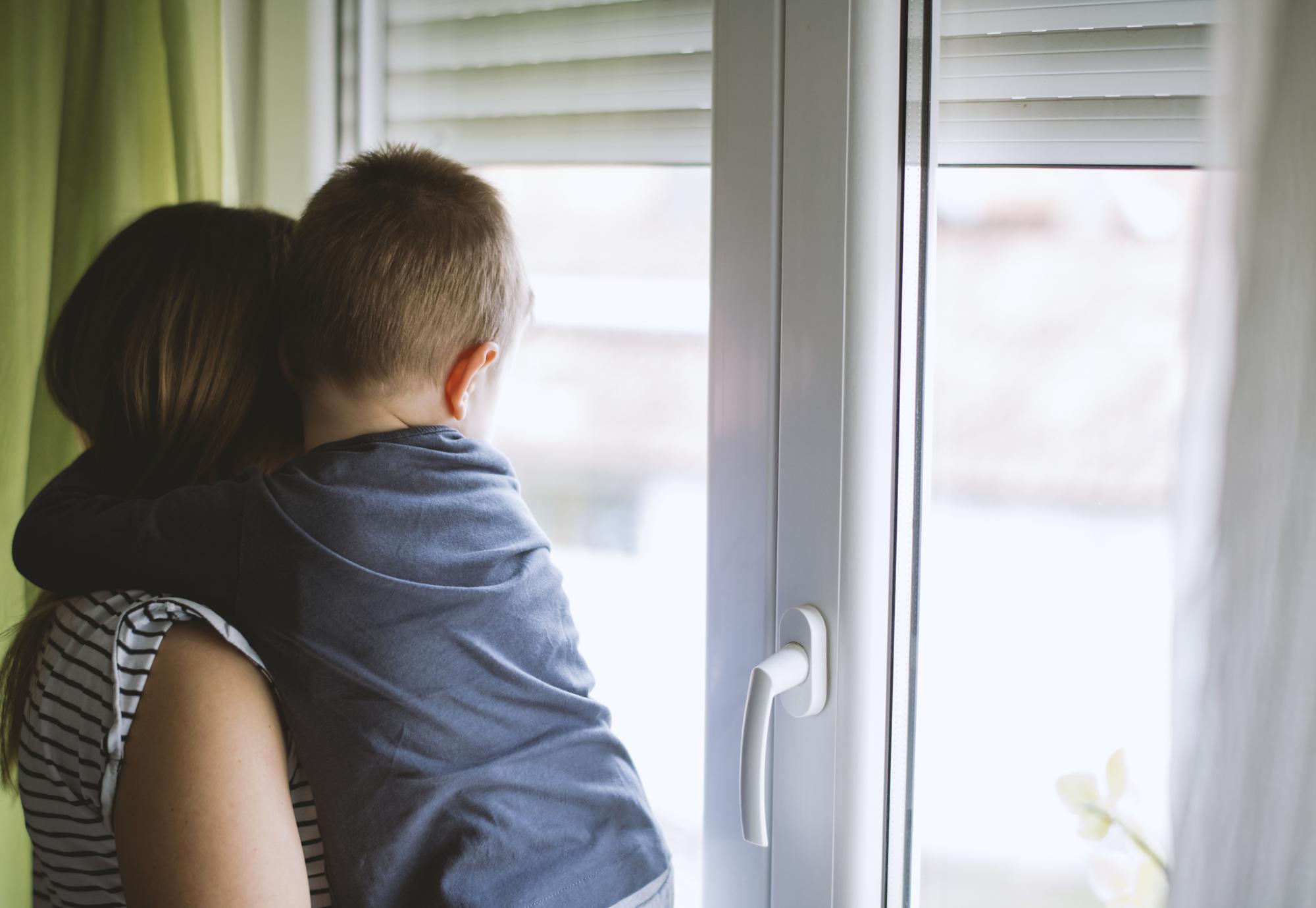 Woman holding boy