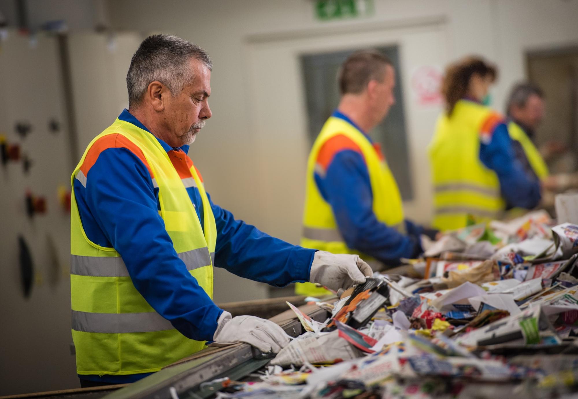 Waste recycling worker