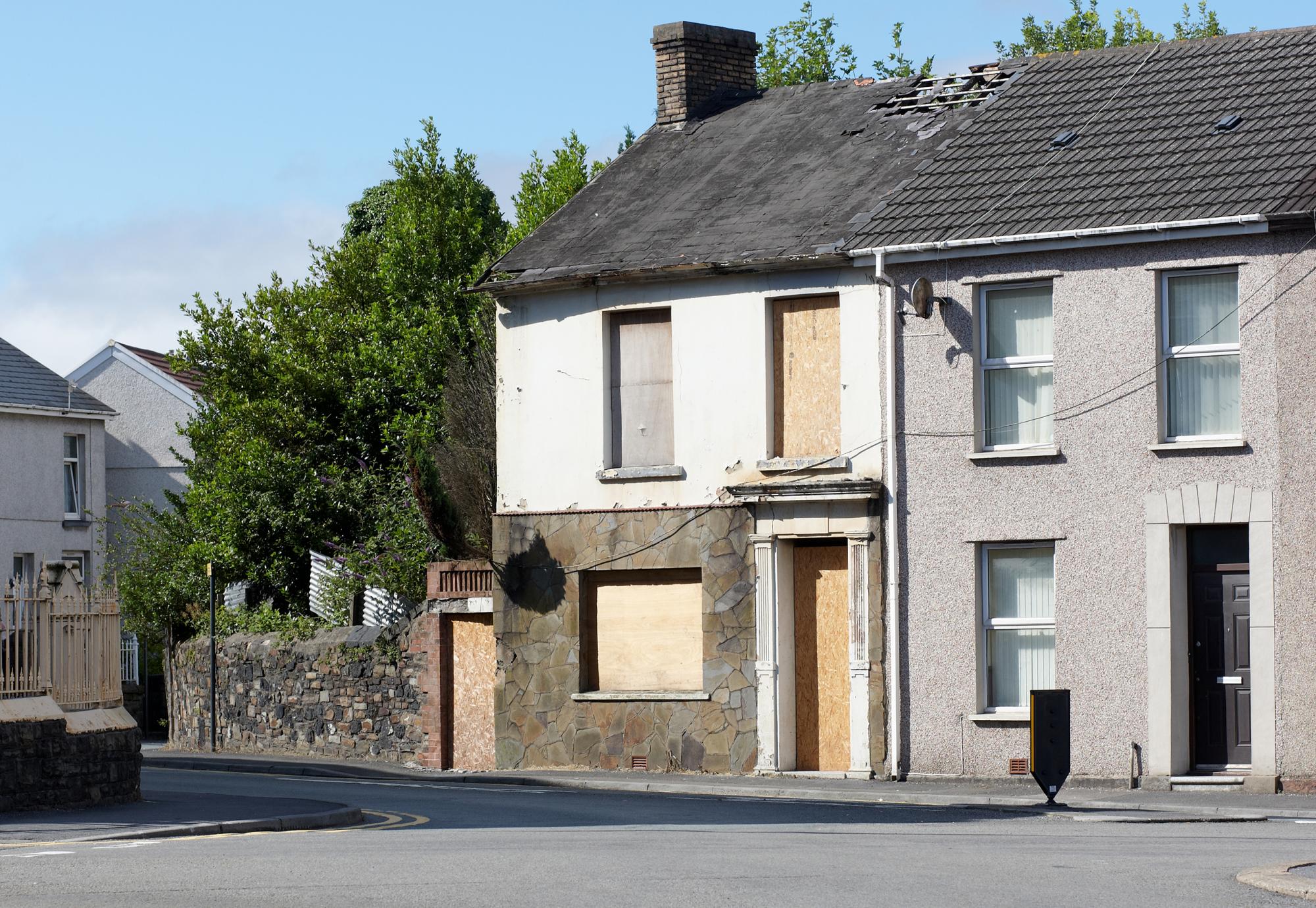 Boarded up house