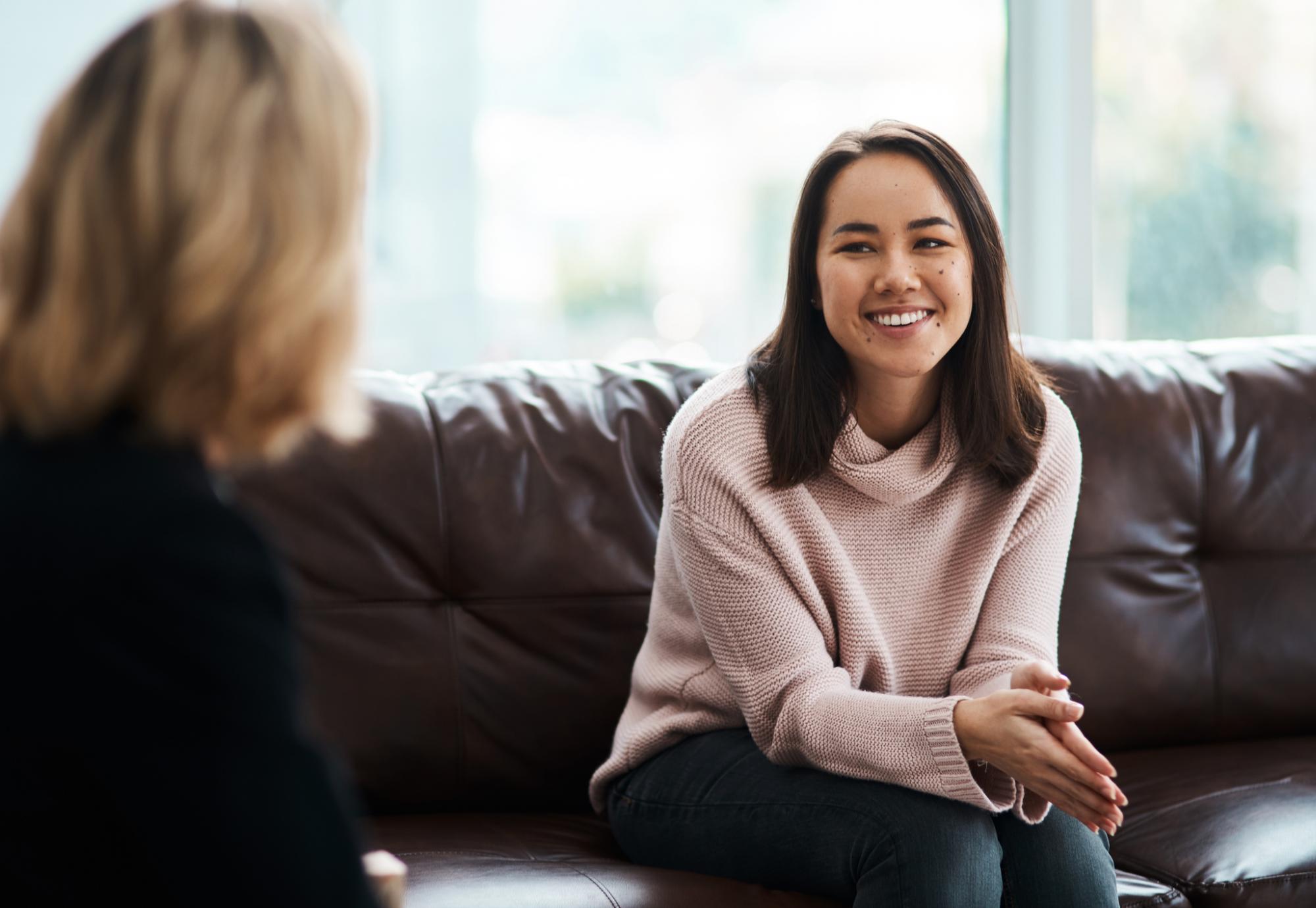 Woman speaking to mental health counsellor