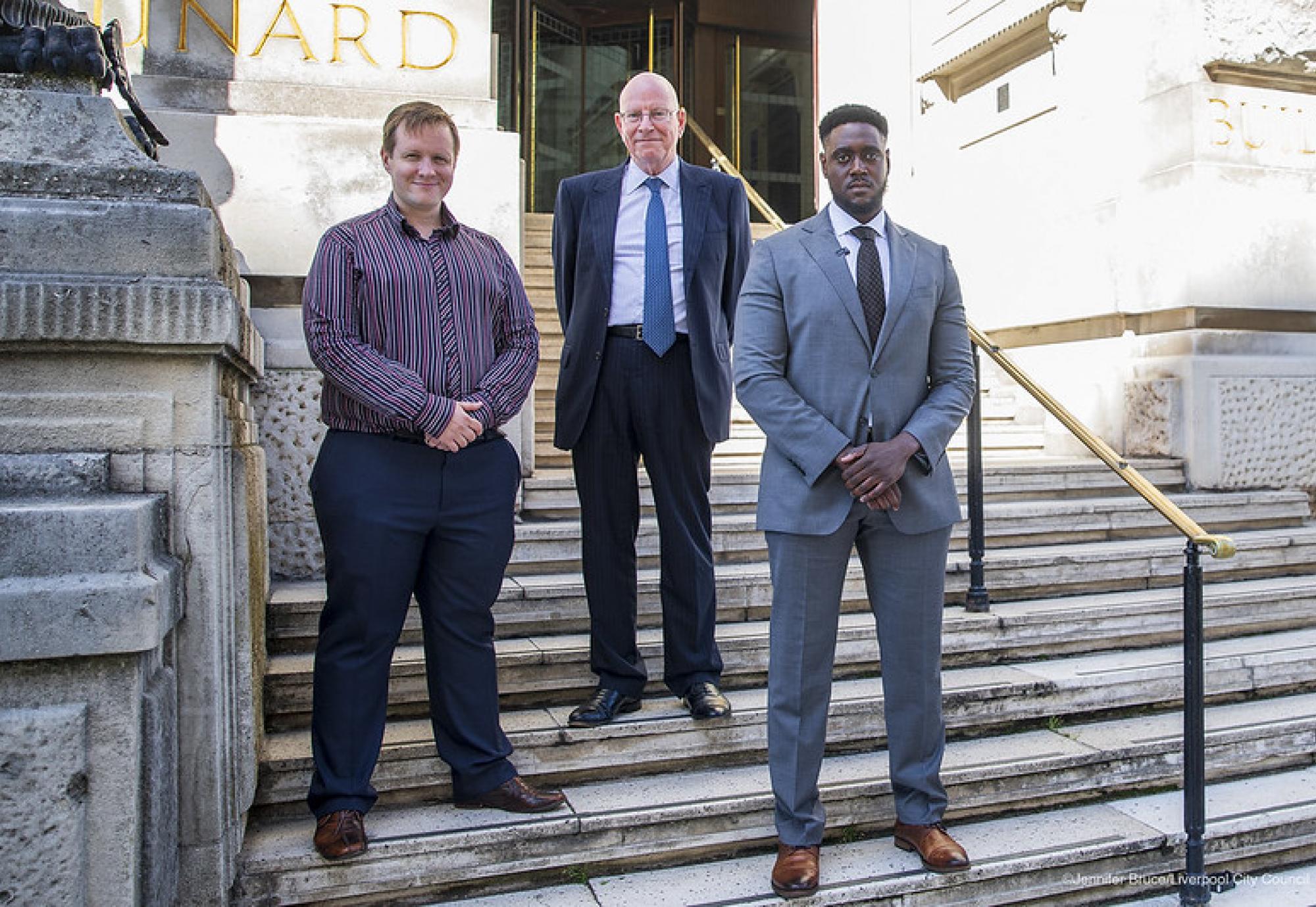 Councillor Kris Brown with new committee advisers Stephen Gregory and Ramone Johnson