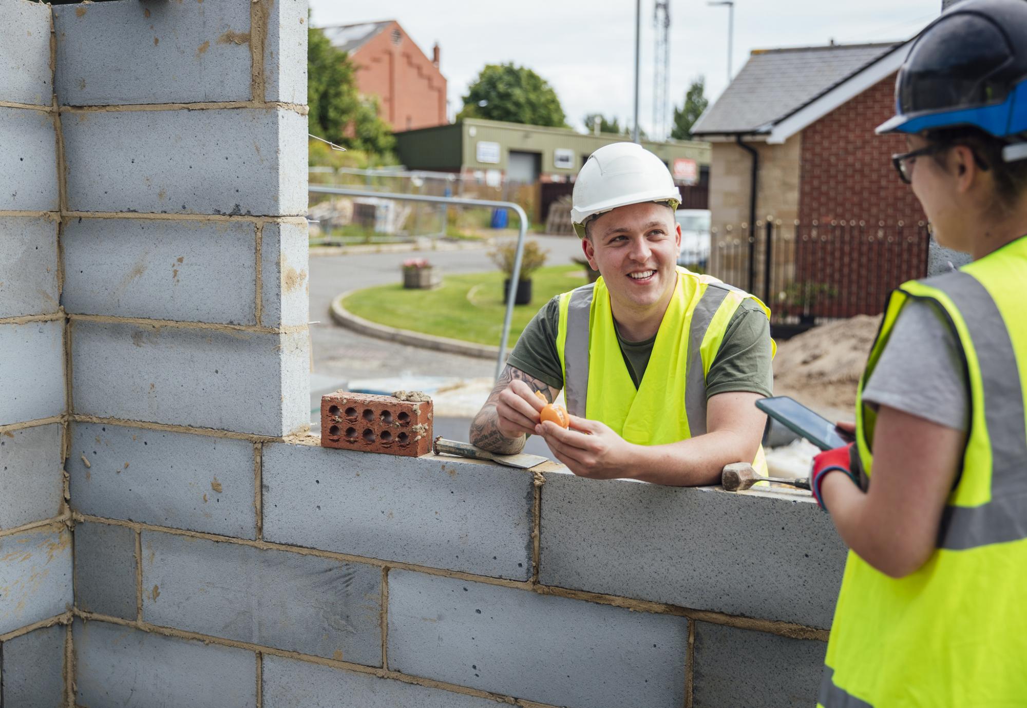 Bricklayers on a construction site