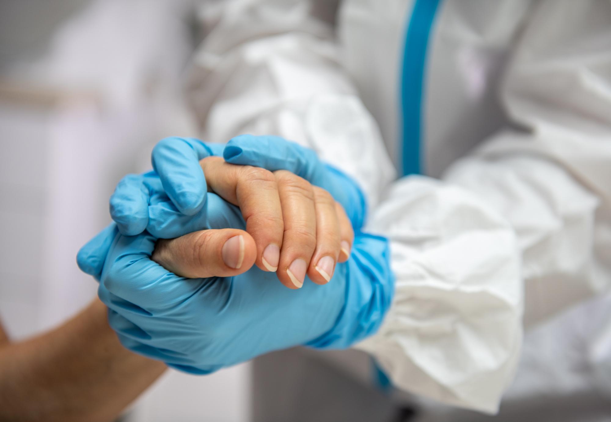 Care worker supporting patient