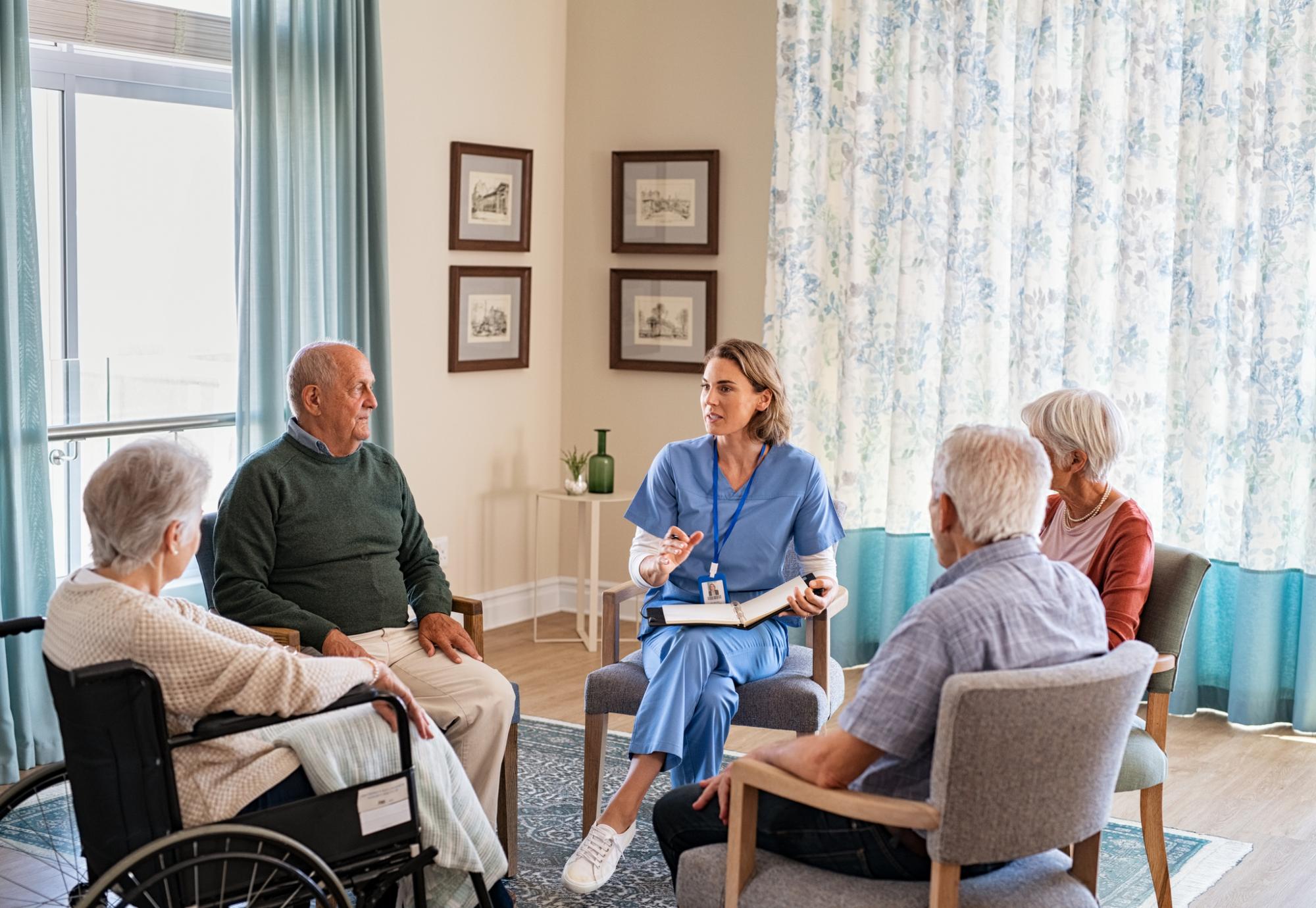 Nurse talking to patients