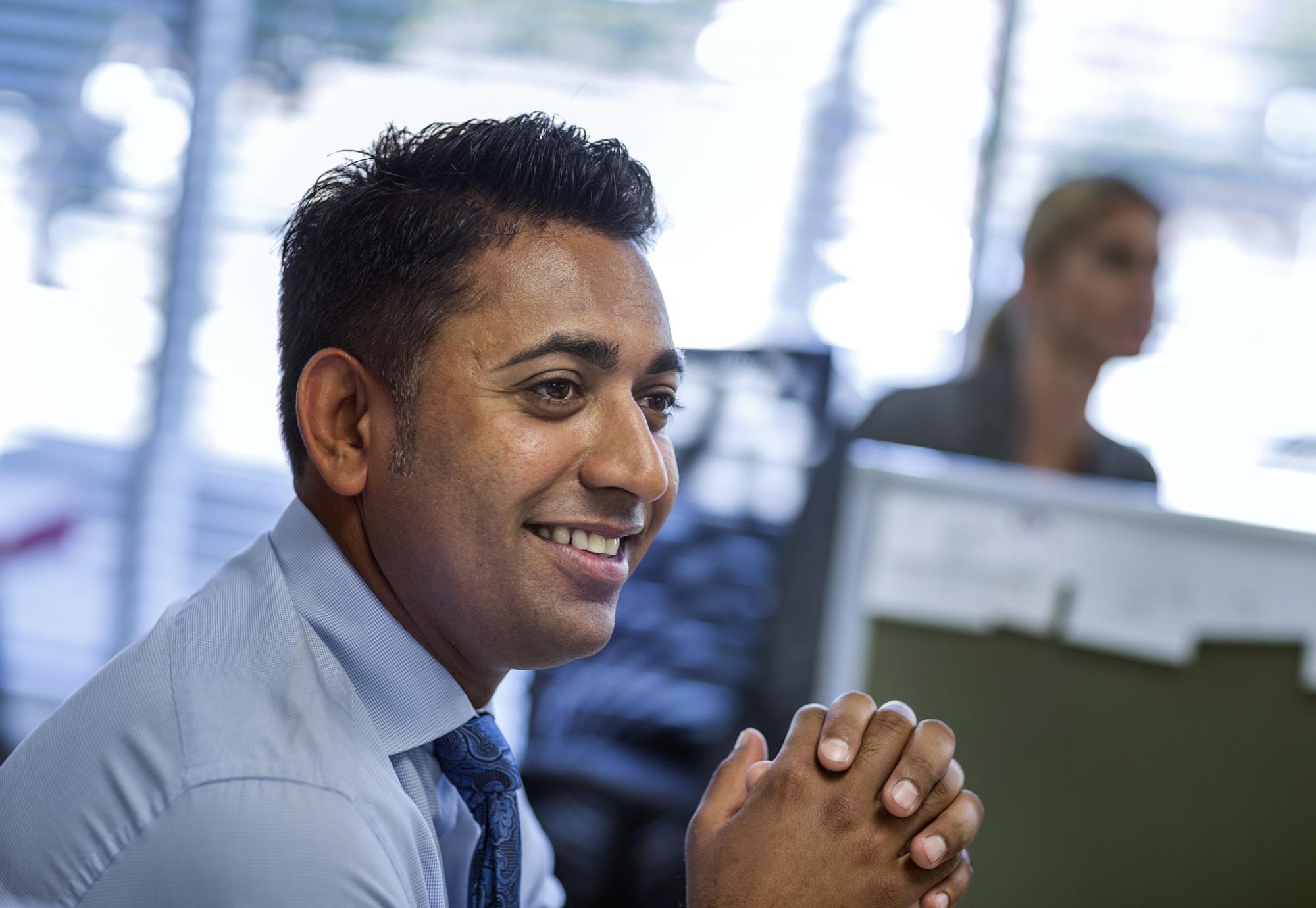 UK office worker smiling