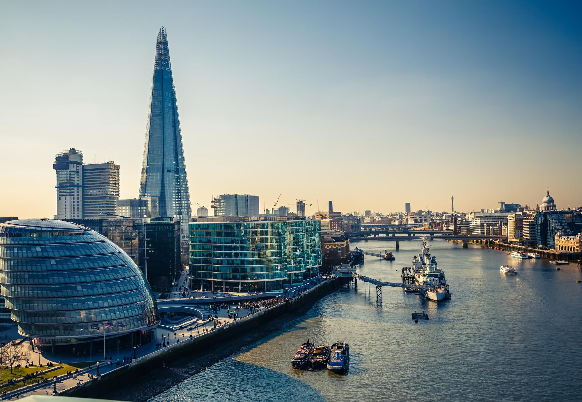 View of London City Hall and skyline at dusk