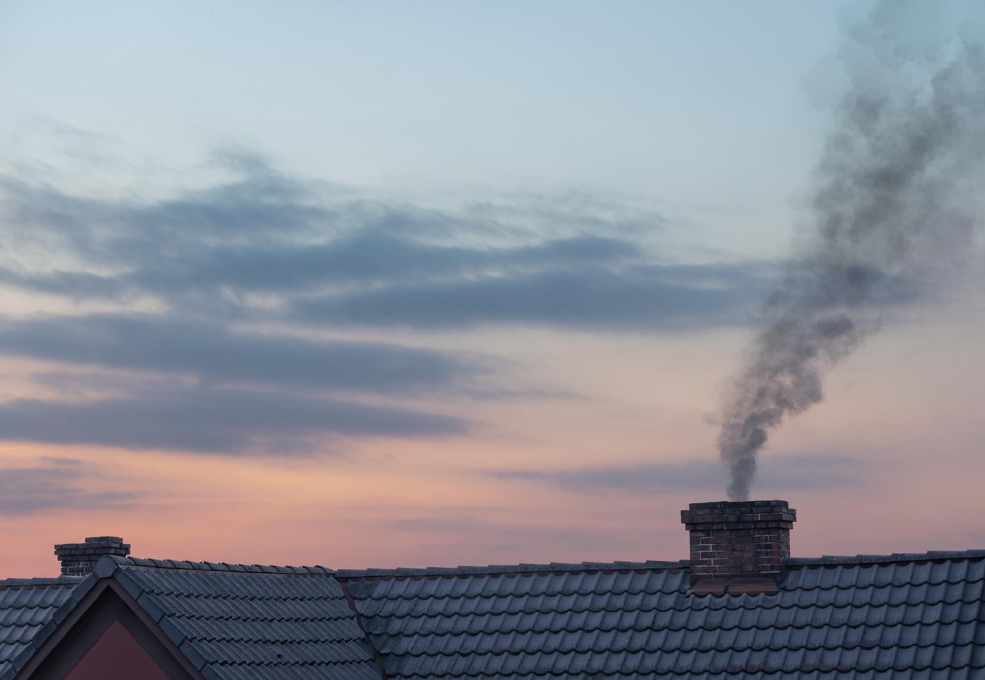 House chimney giving out smoke