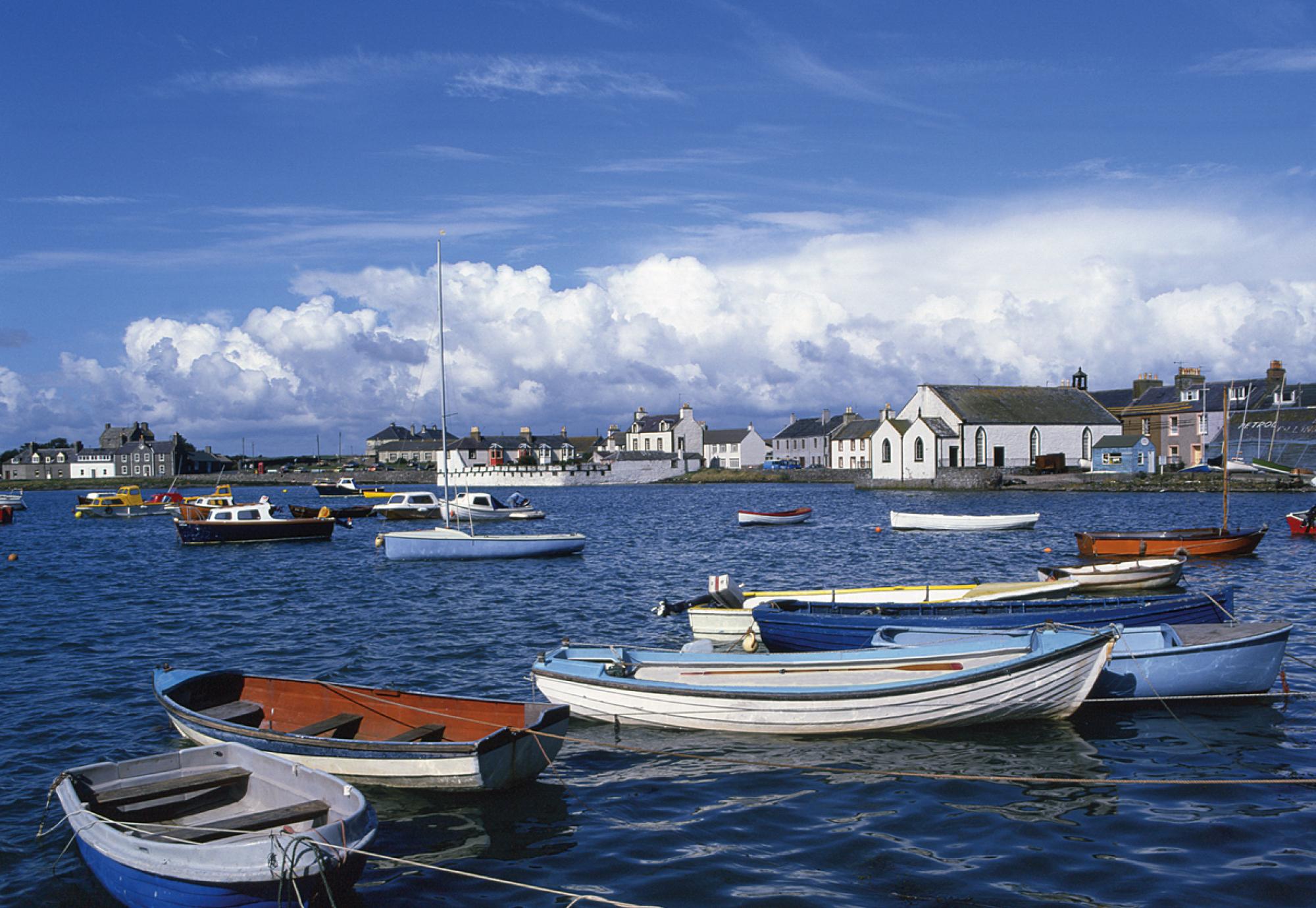 View of boats on the water at Whithorn on a sunny day