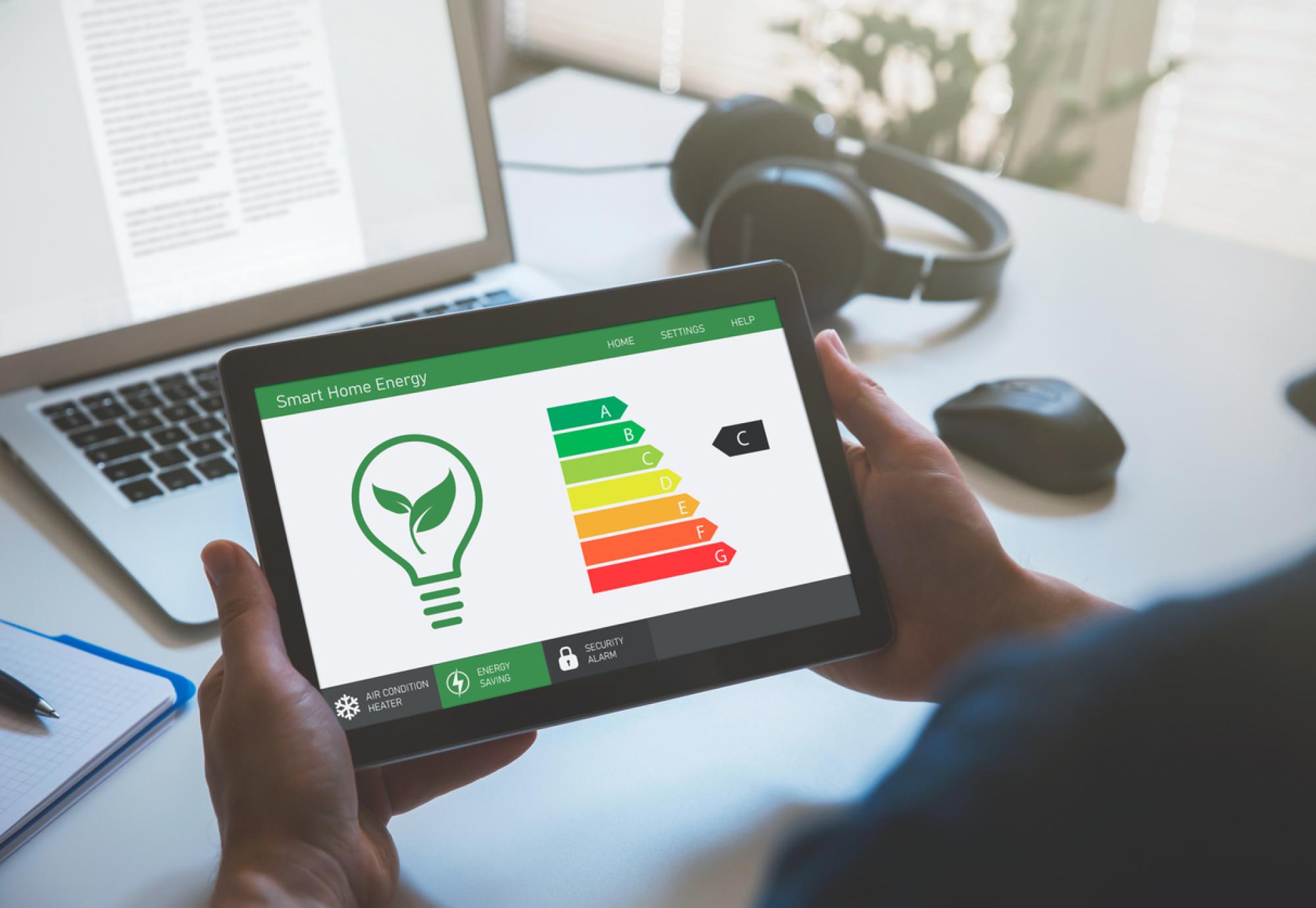 A tablet showing energy levels in a home