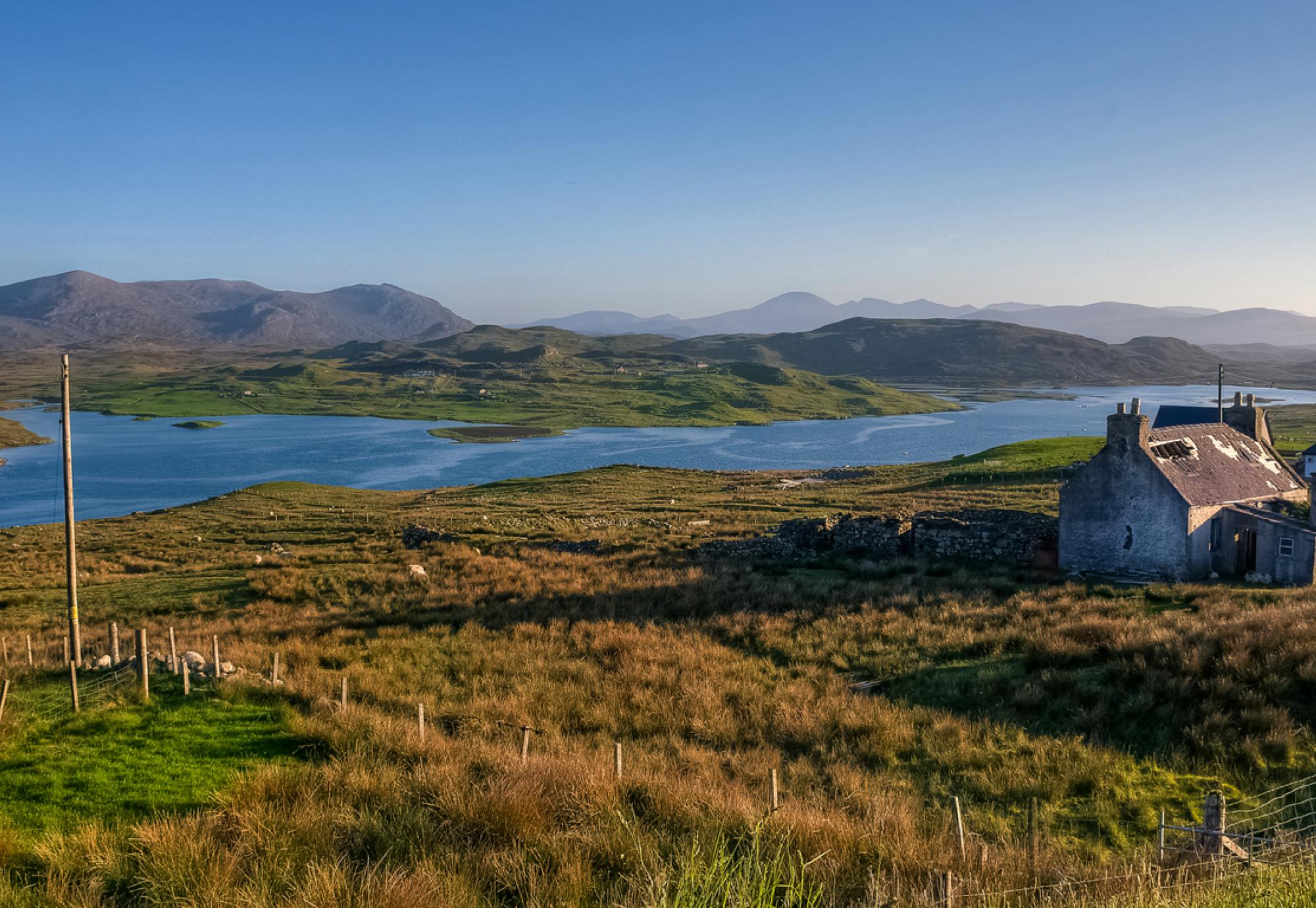 Rural Scottish village with lake in the background