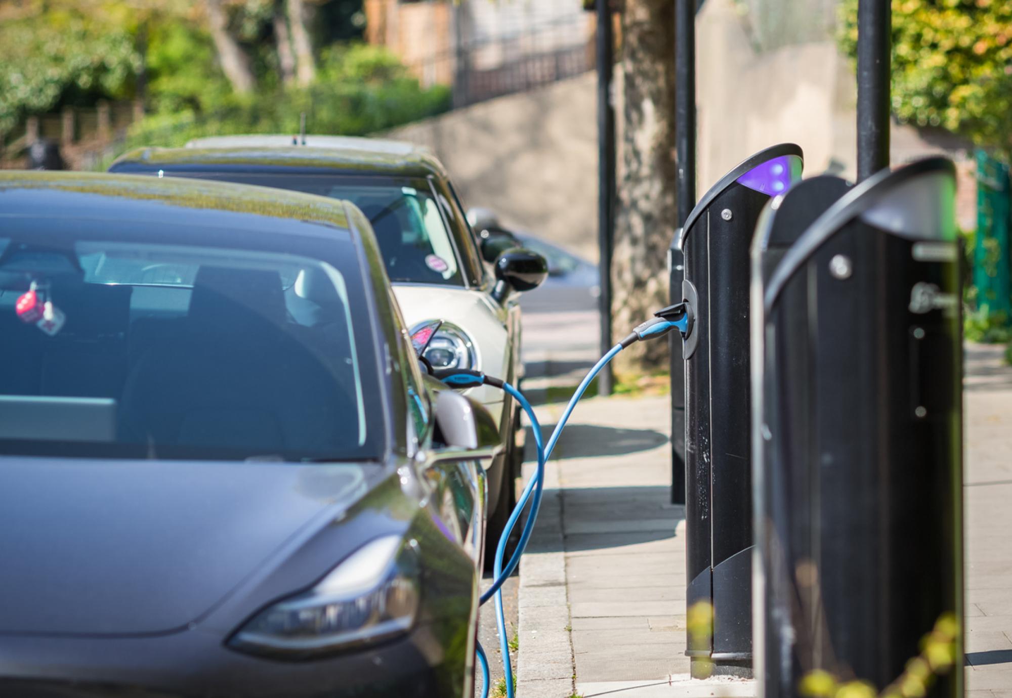 Electric vehicles being charged in London