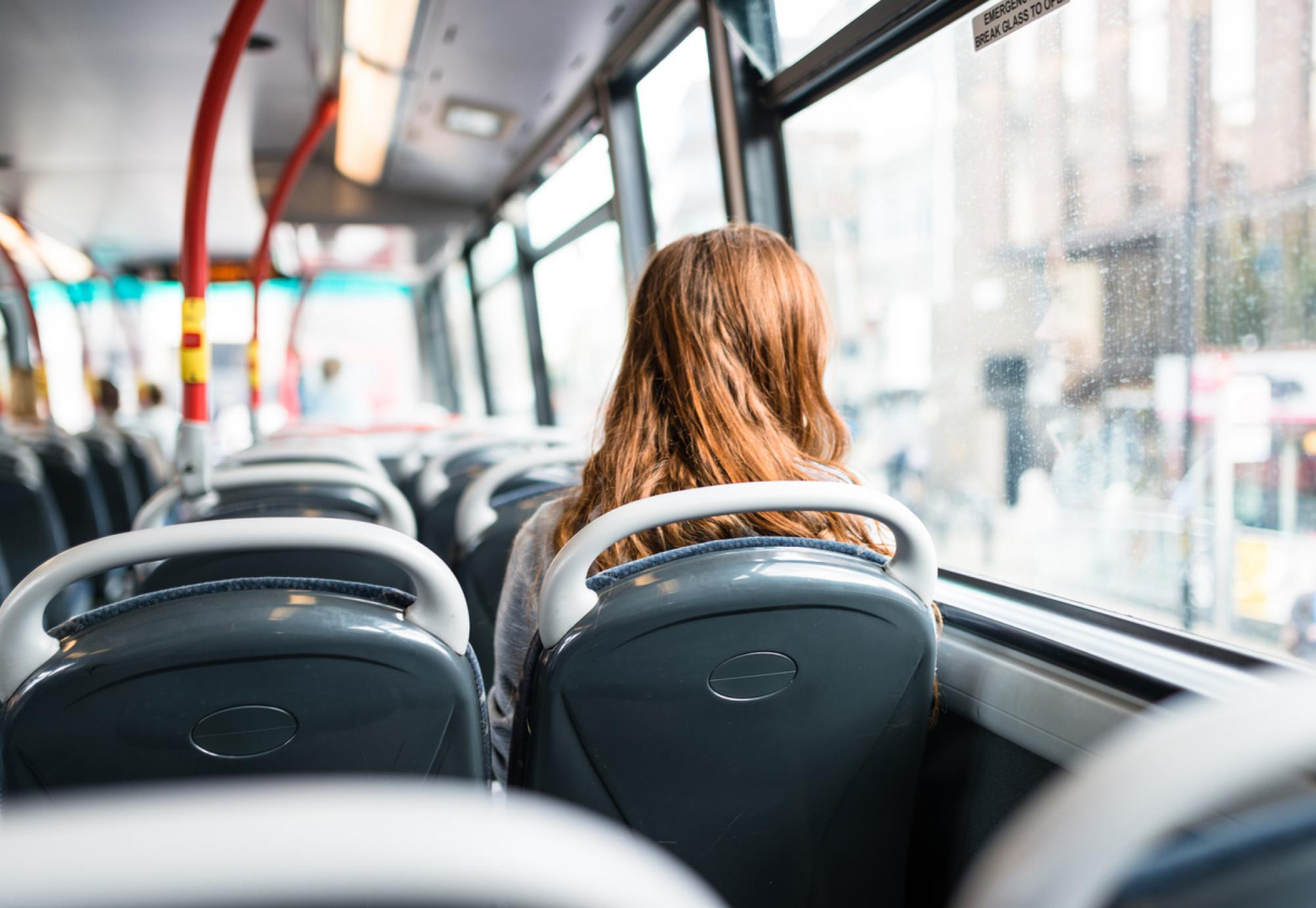 Woman sat on a bus