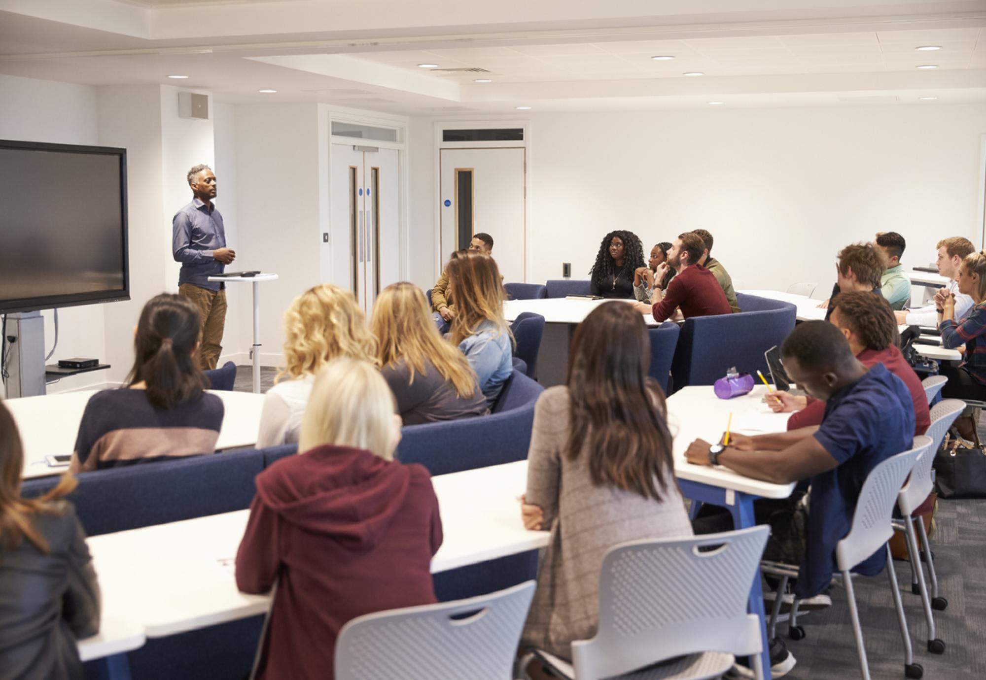 University students in a classroom with lecturer