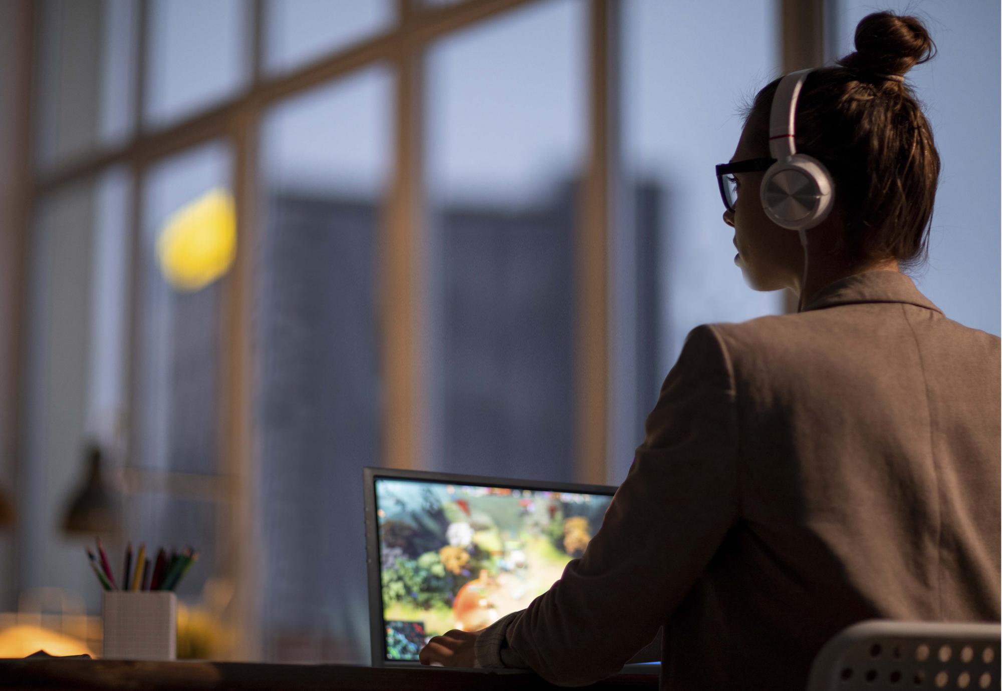 Woman using Acer computer 