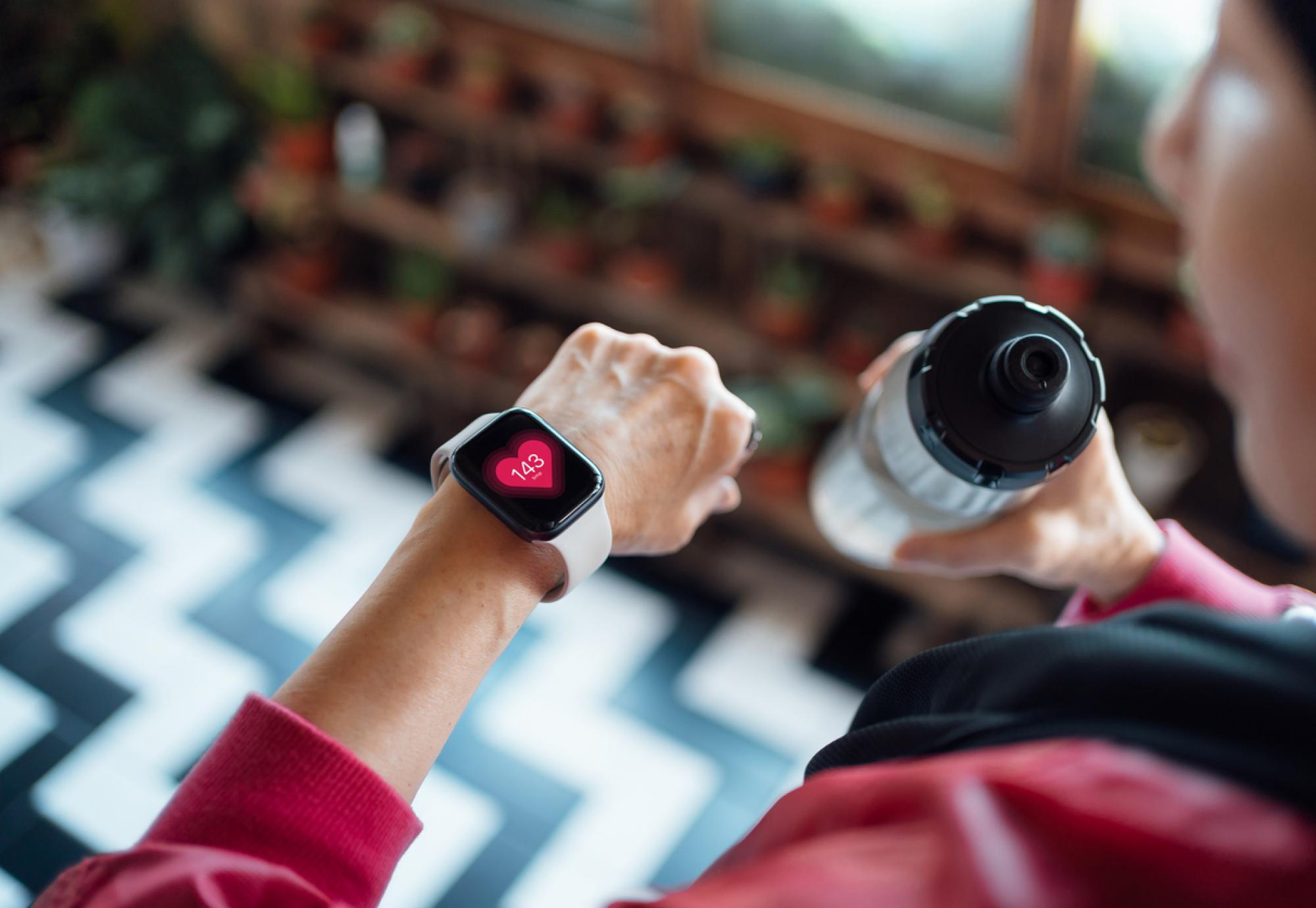 Woman looking at a smart watch