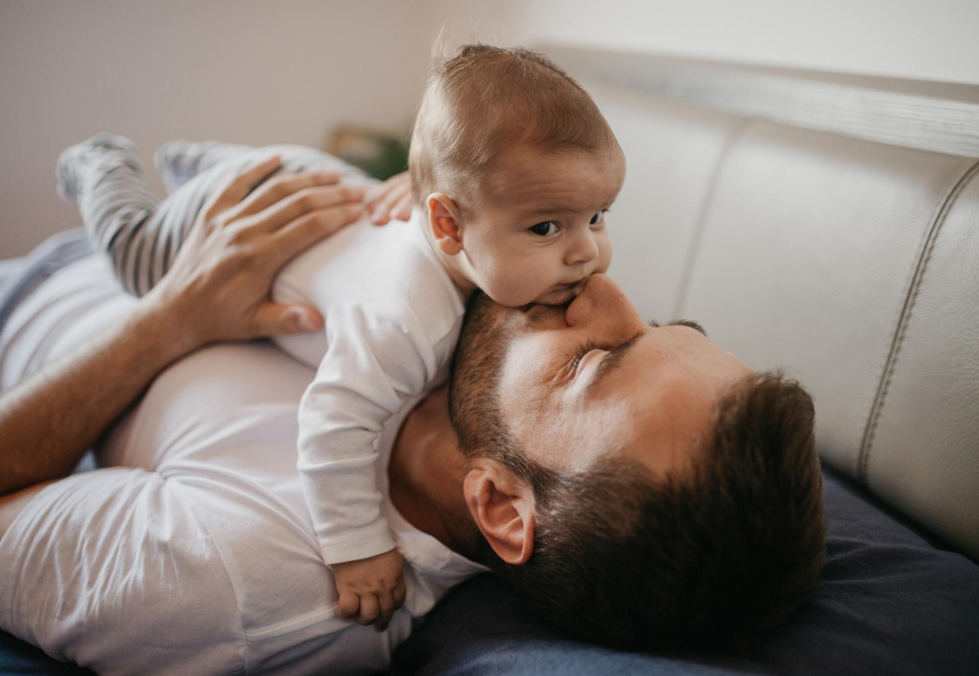 Baby playing with dad