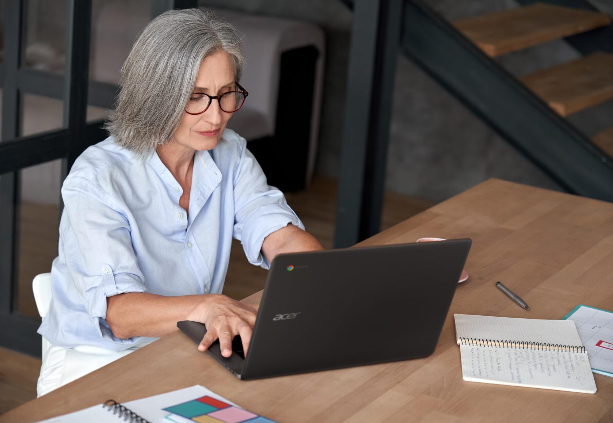 Woman using an Acer computer for business