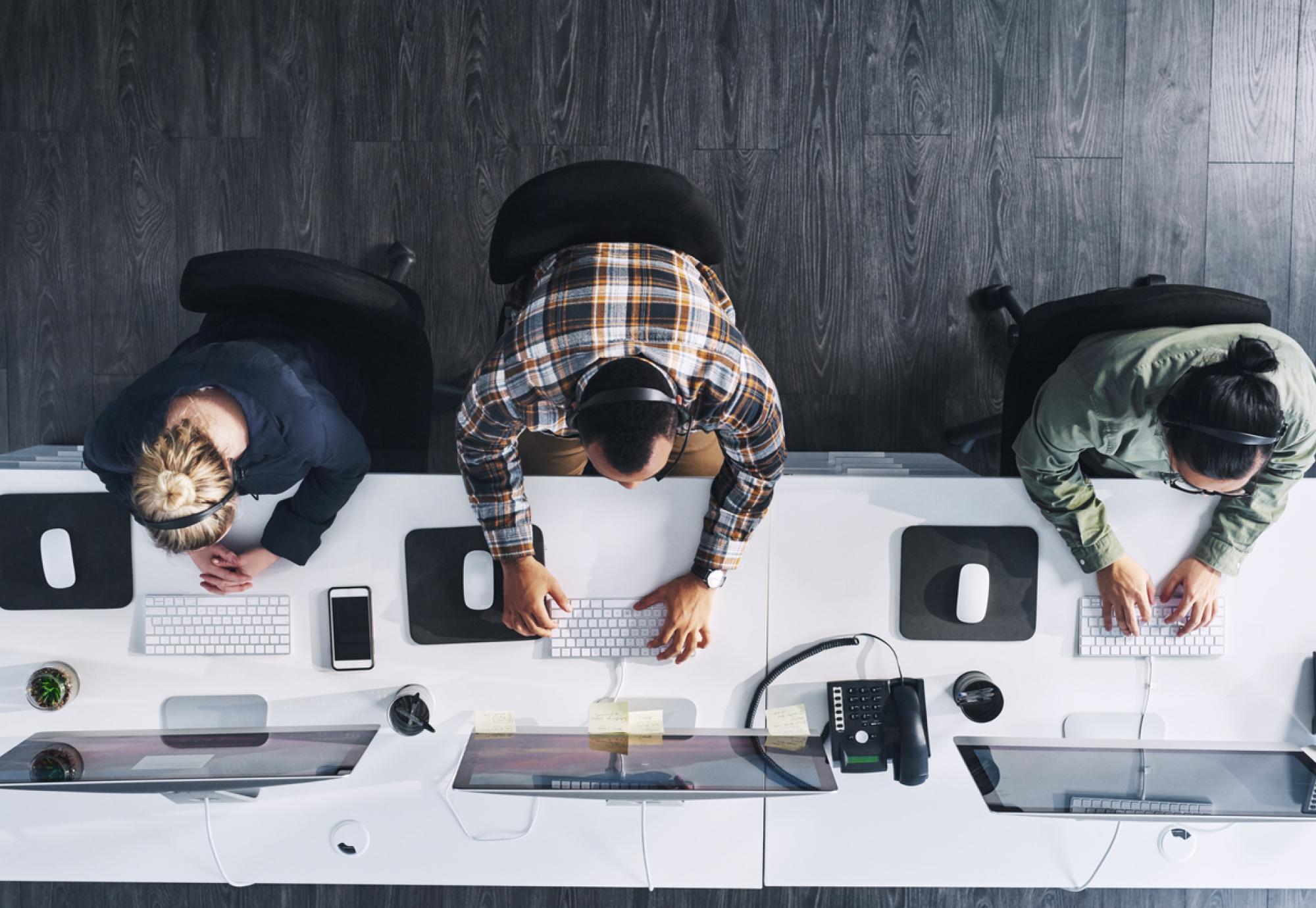 High angle shot of a group of people working in an office