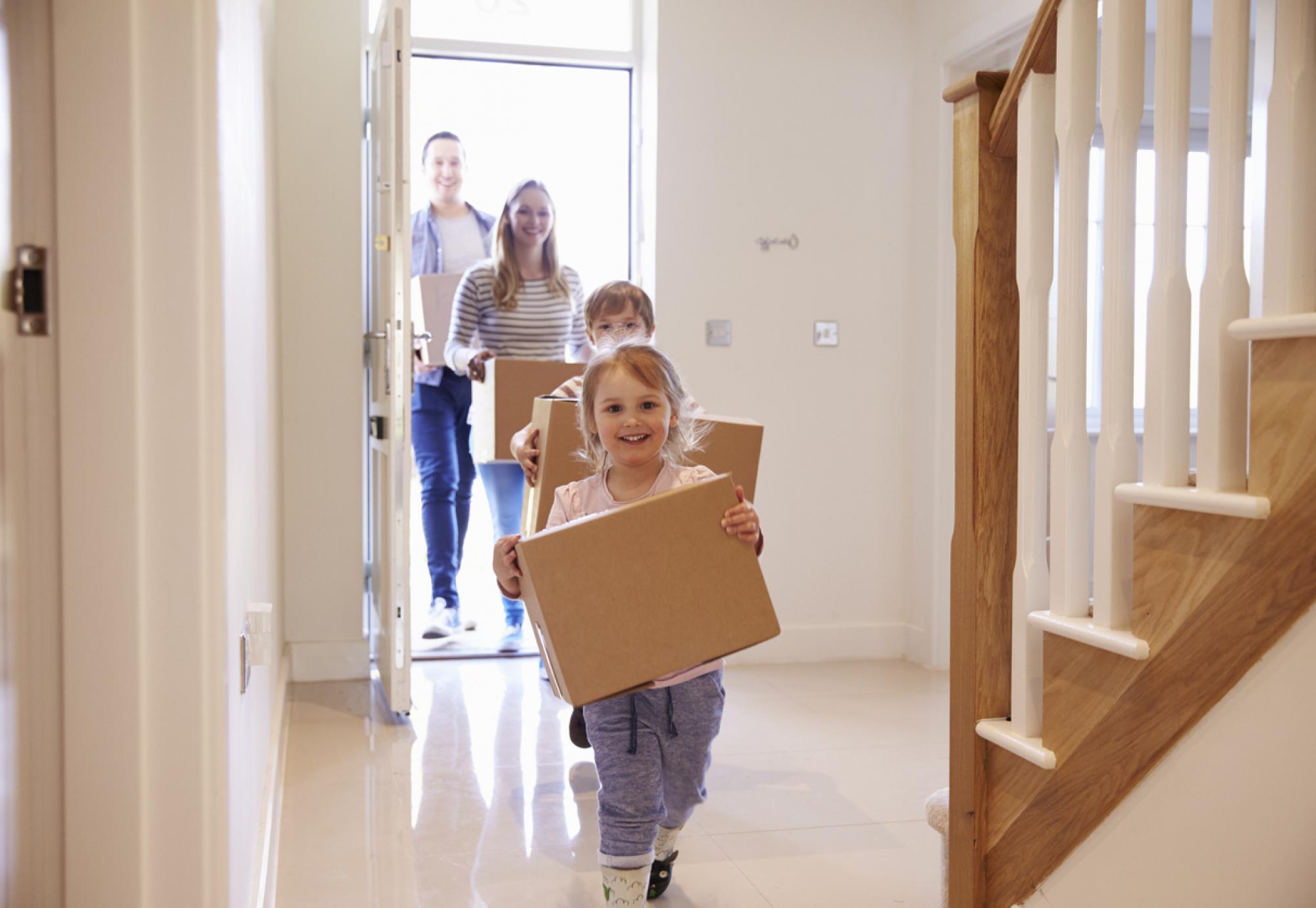 Family moving into a new home