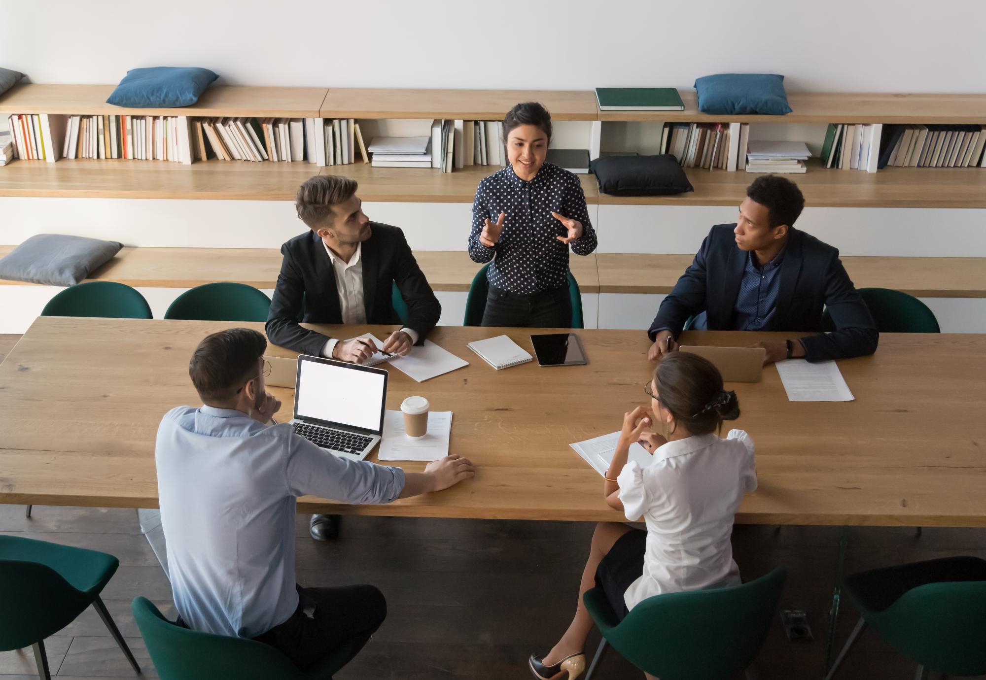 Group of people around a desk