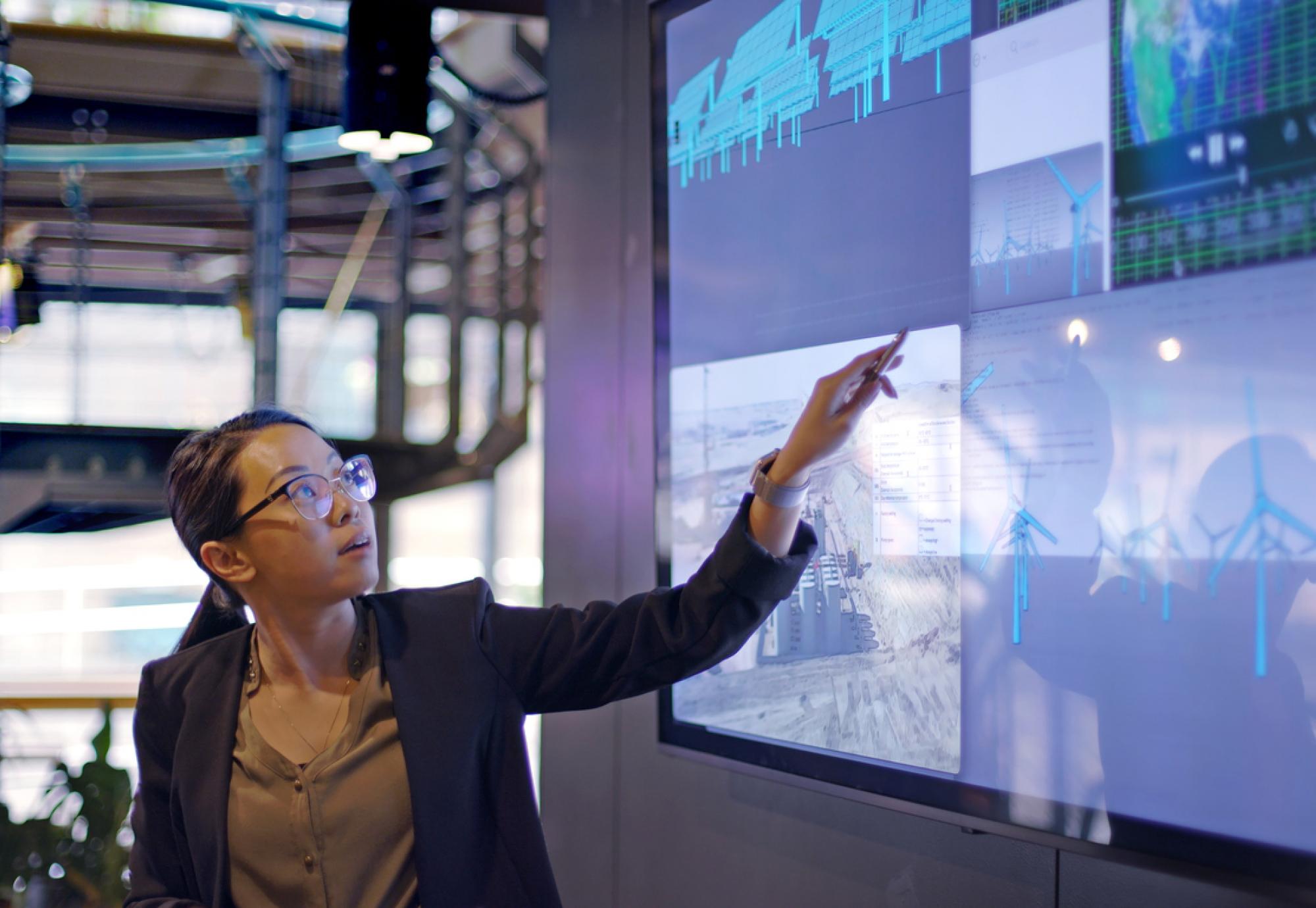 Woman using data in meeting