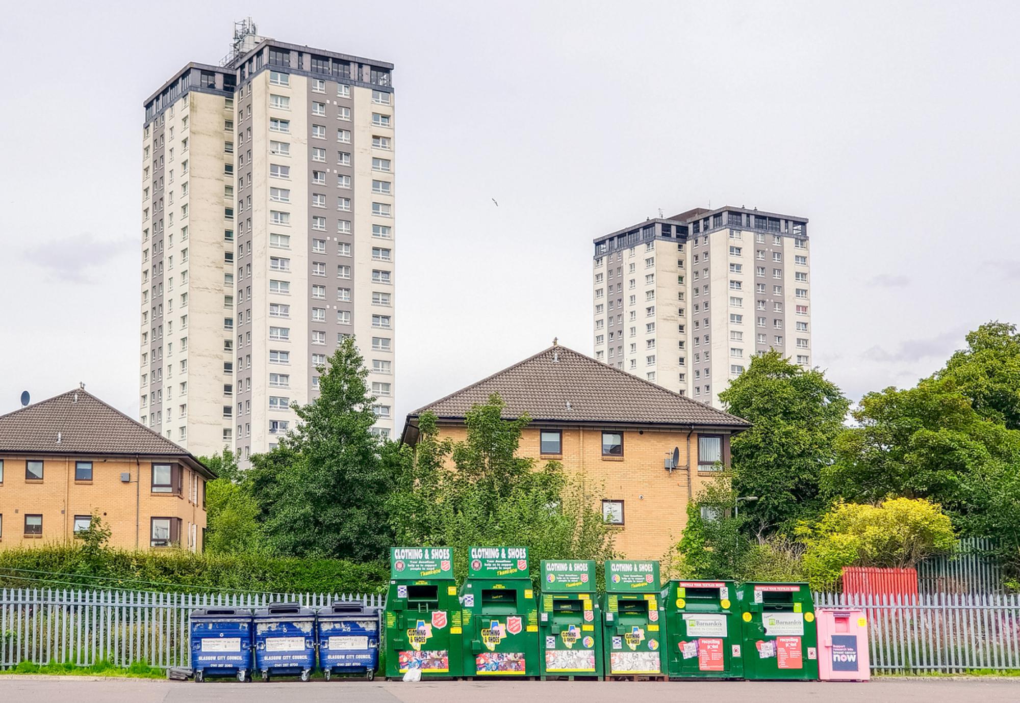 A series of recycling and charity donation containers in the Knightswood area of Glasgow.