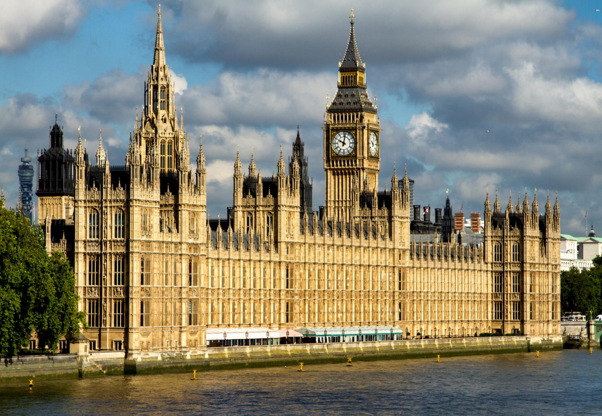 Wide shot of the Houses of Parliament in daylight