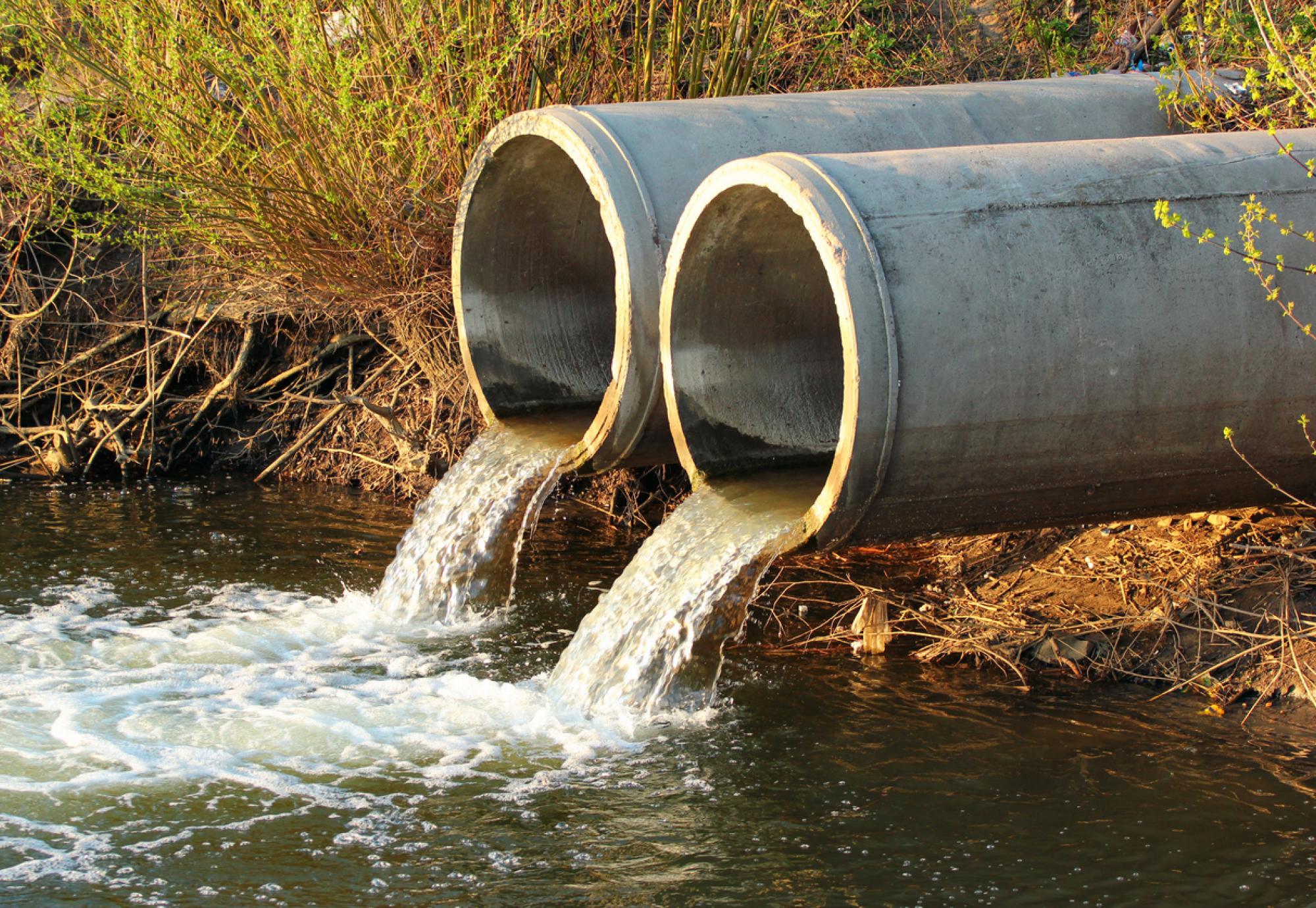 Discharge of sewage into a river