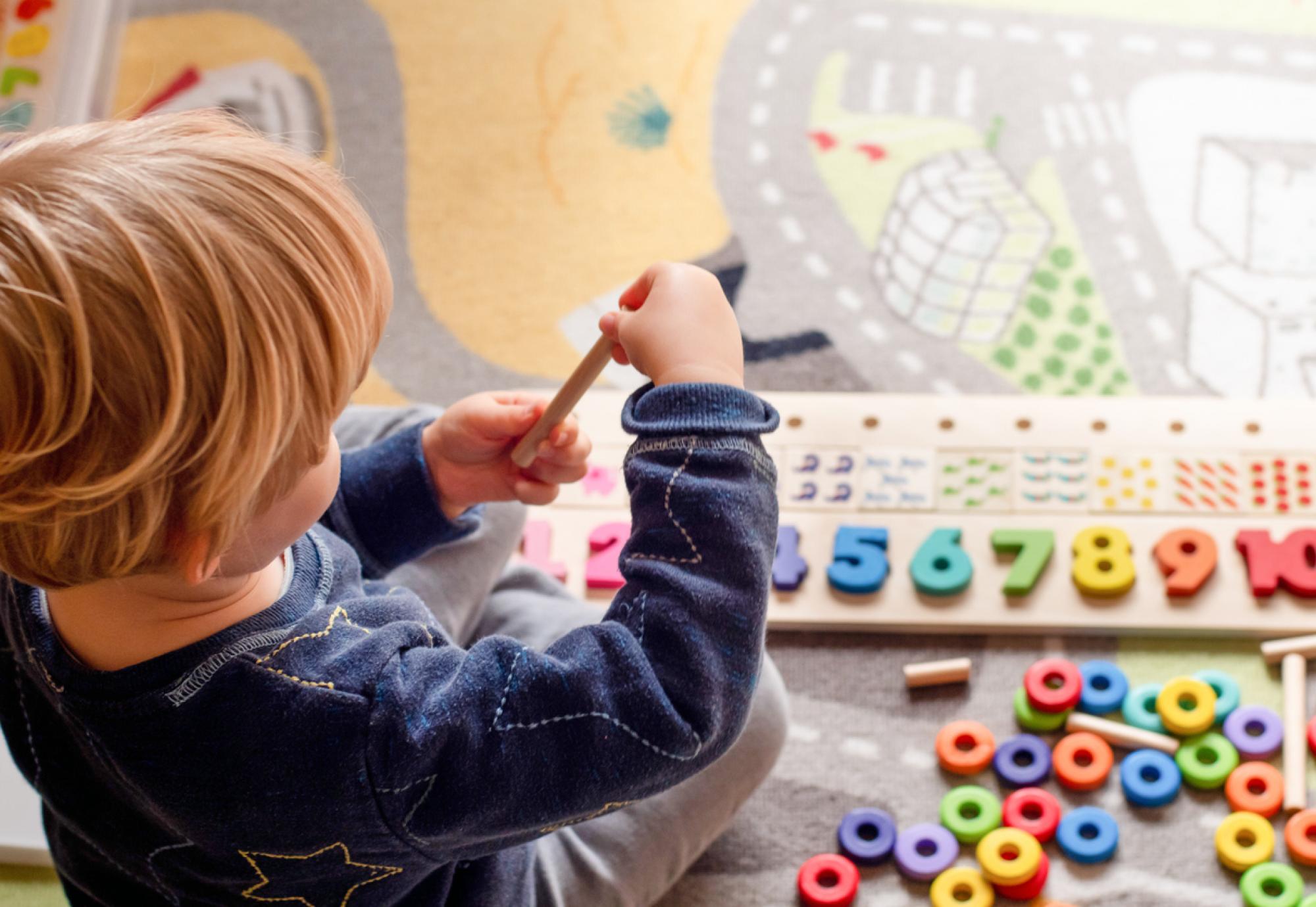 Child playing with toys