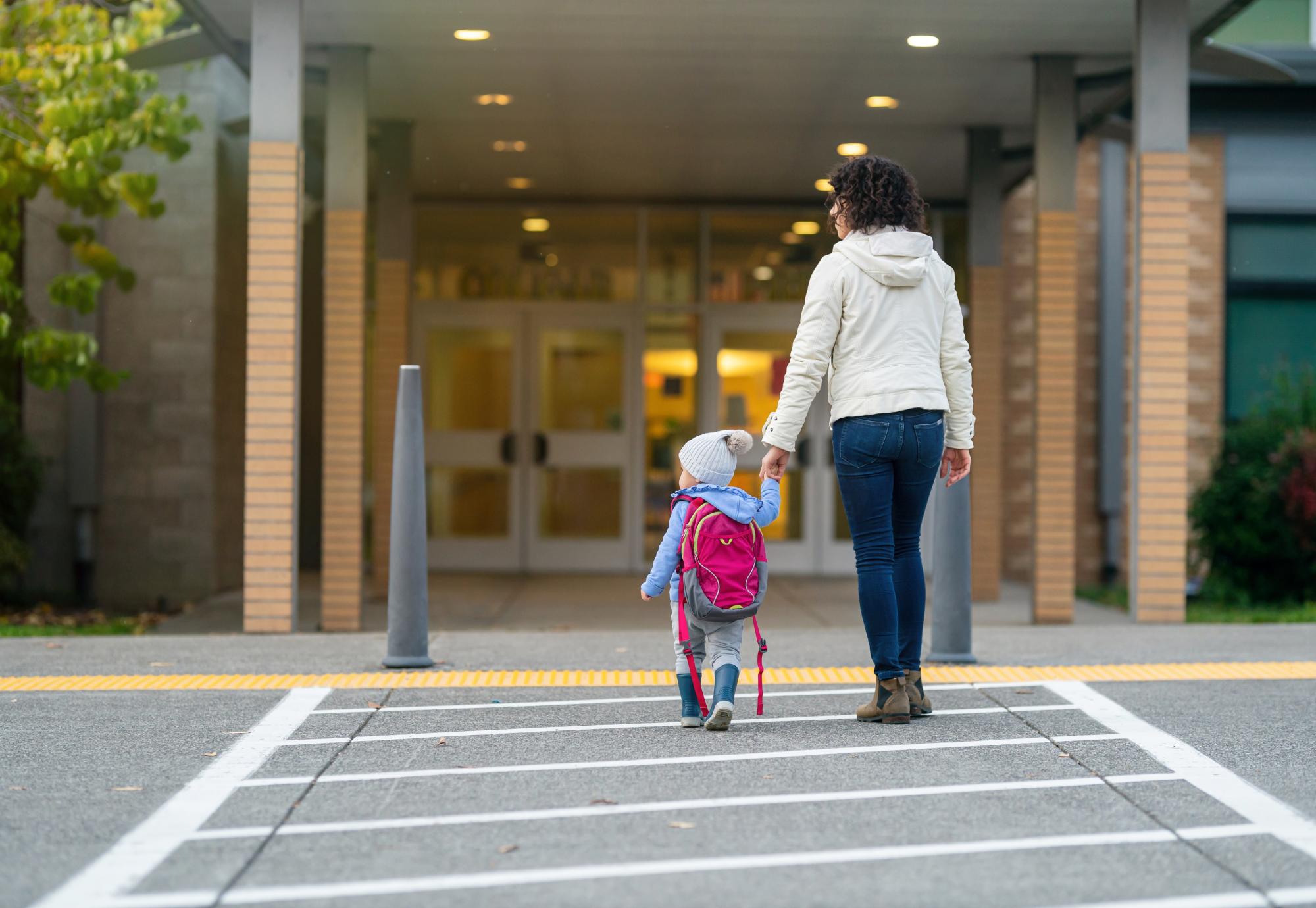 Woman walking with child