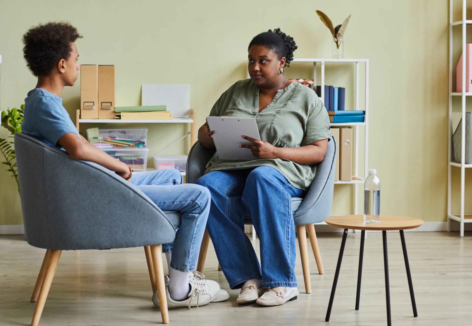 Healthcare worker with a young man