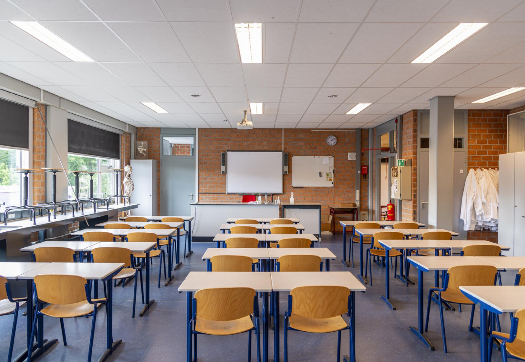 Shot from the back of an empty classroom in England