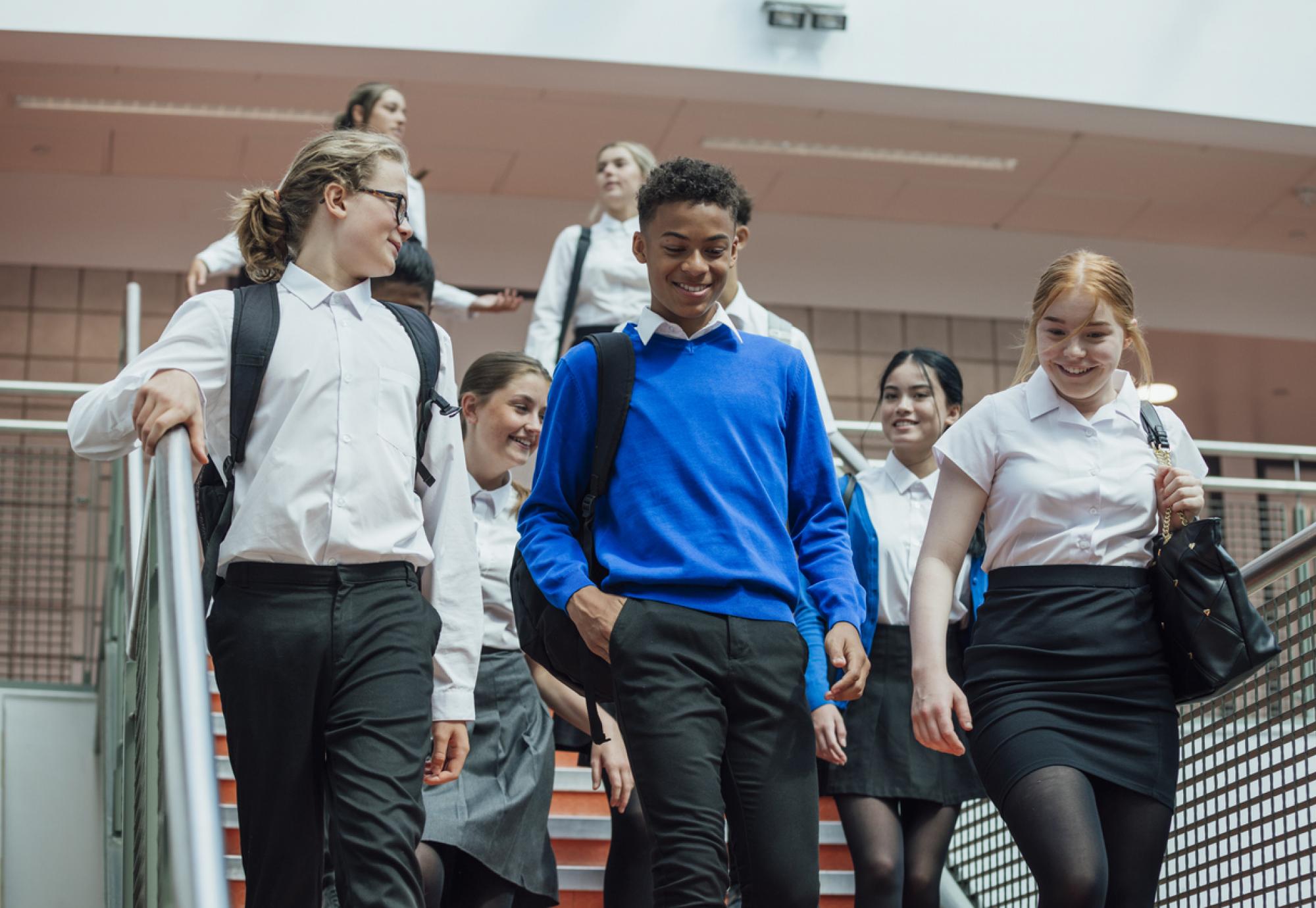 Three school children walking
