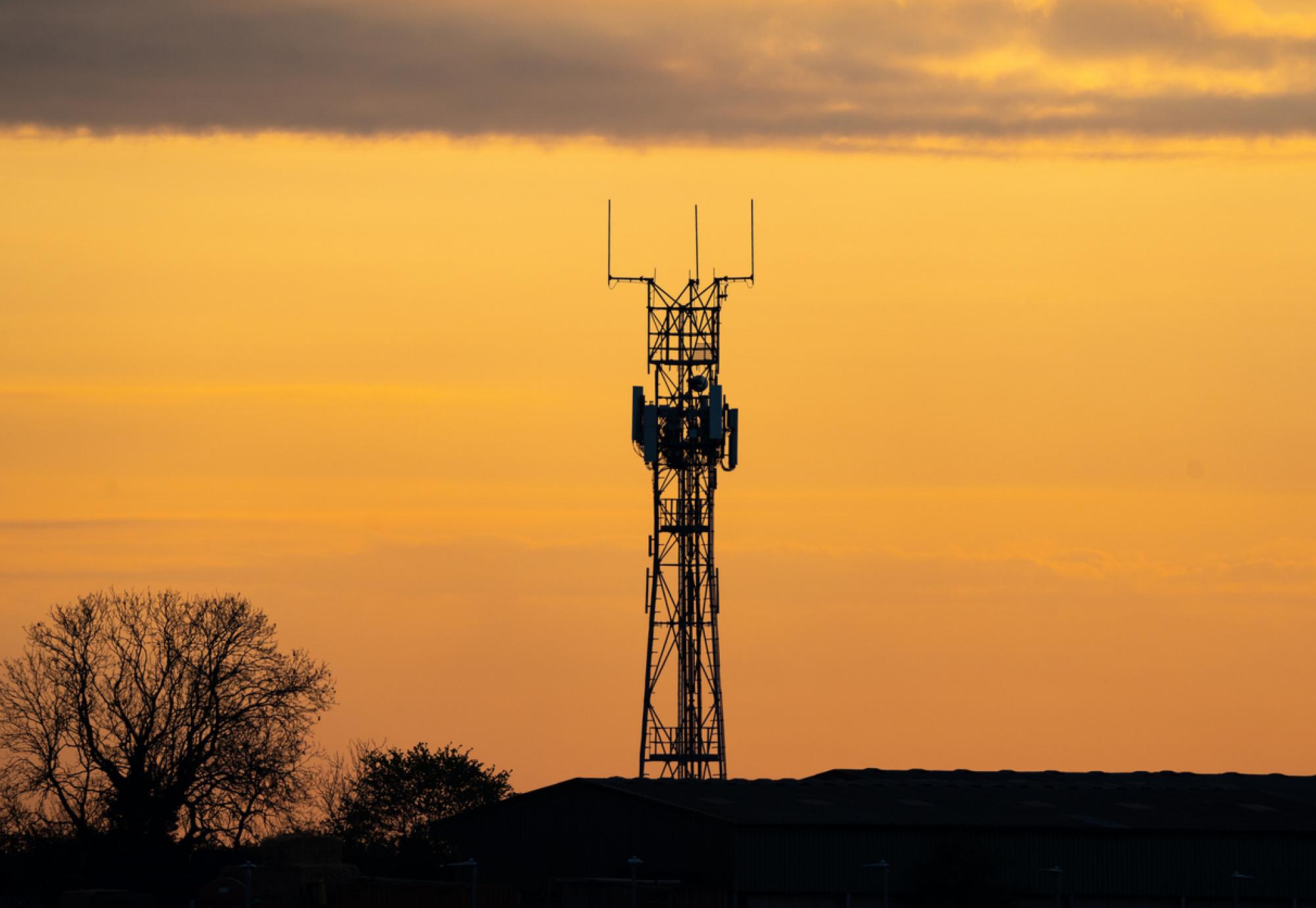 5G tower at sunset