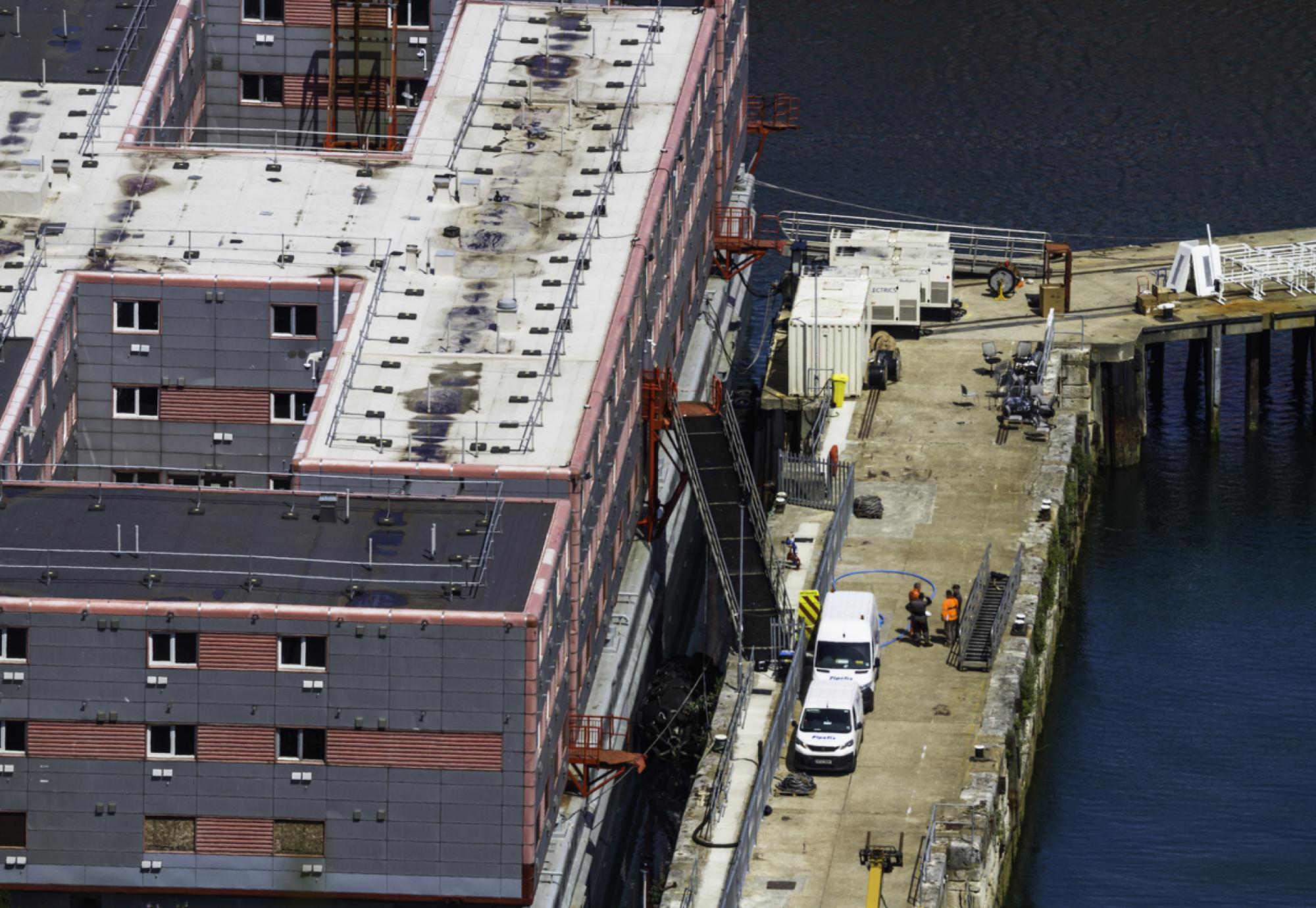 Bibby Stockholm barge from above docked on land