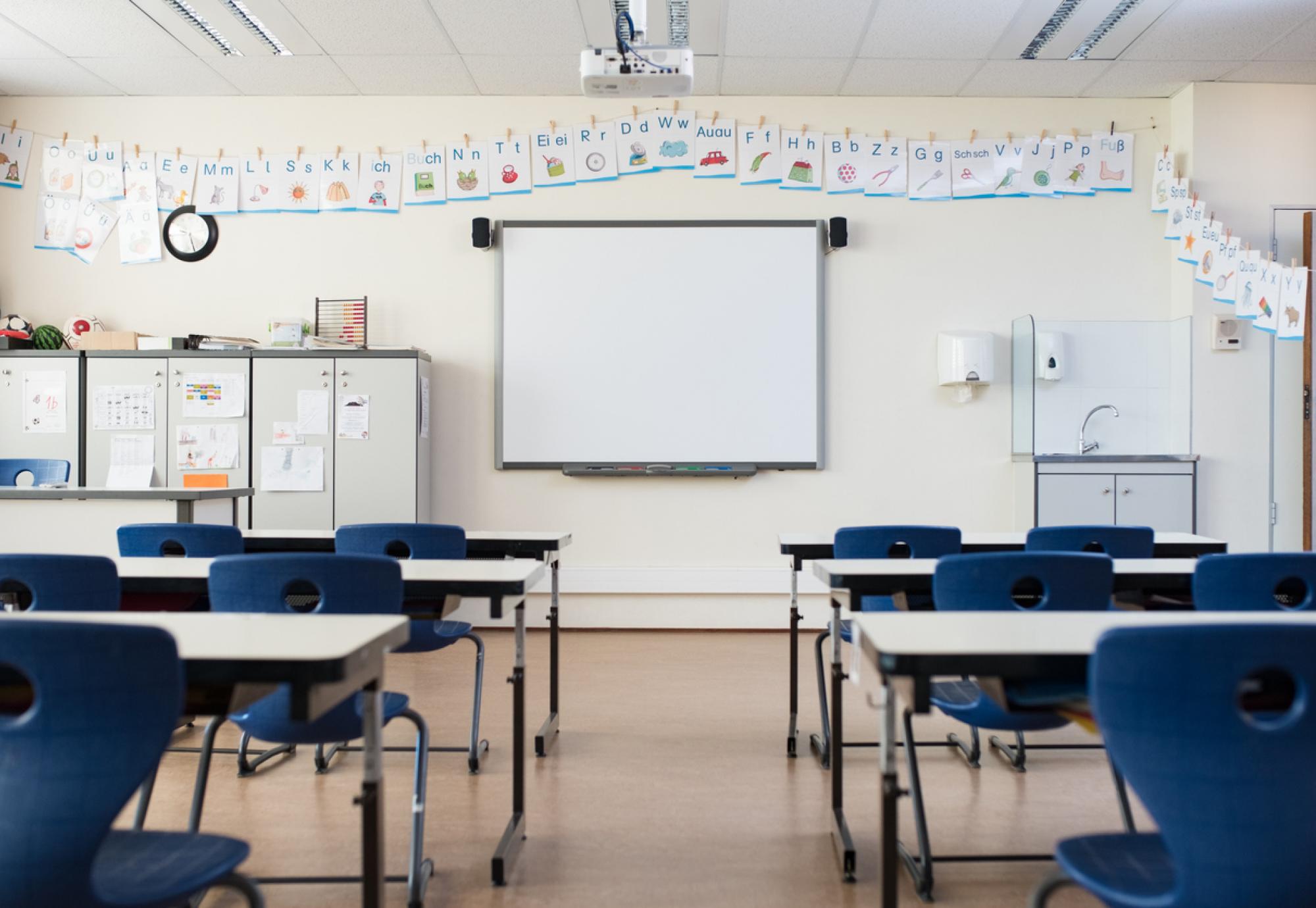 Empty classroom with whiteboard